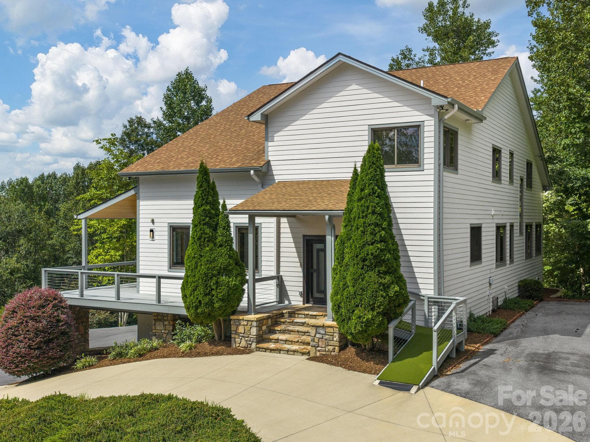 Main Level Entry w/additional ramp access. Main Level parking for several vehicles. - 248 Wisdom Cove Road, Flat Rock