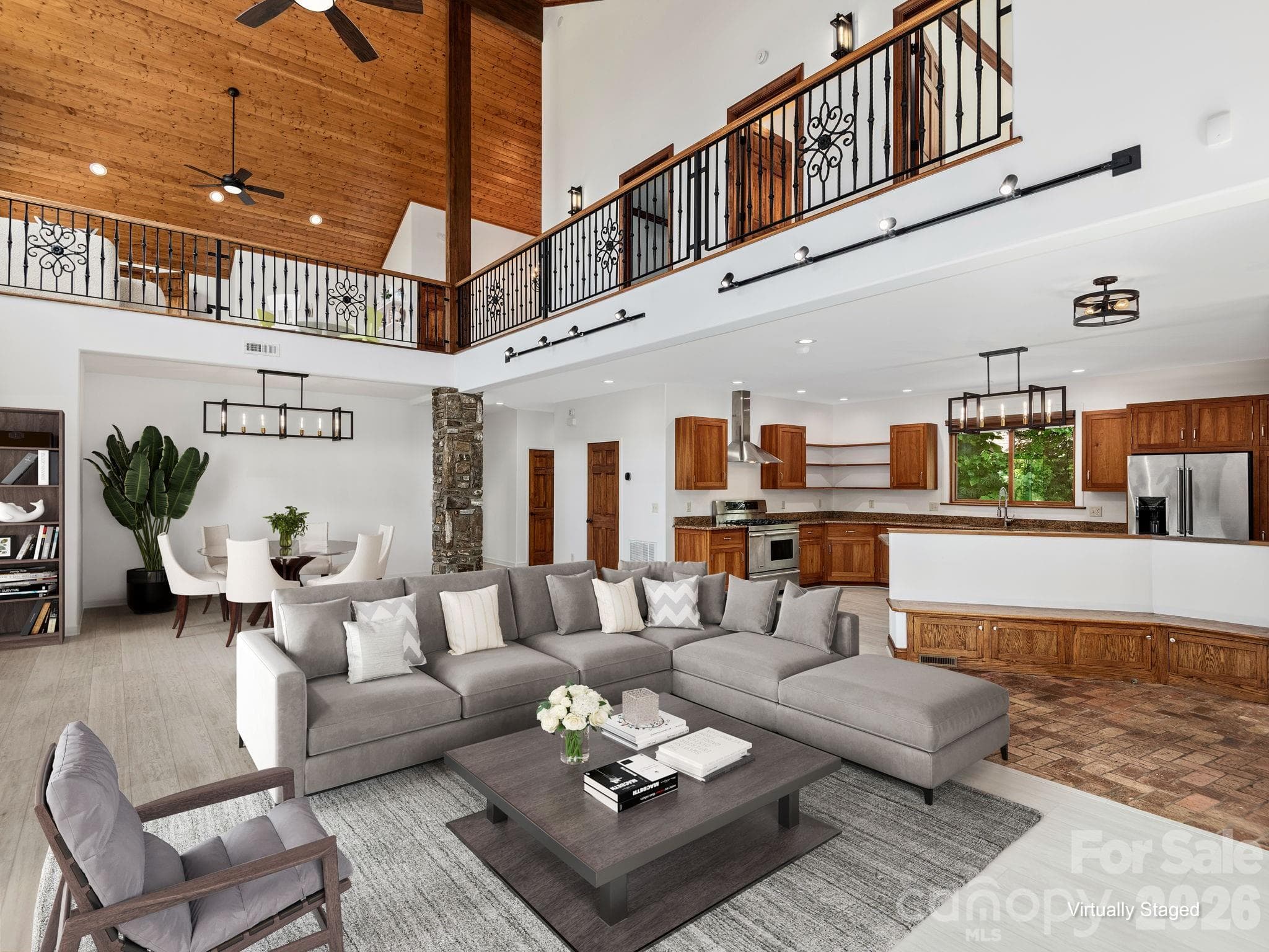 Open Great Room w/Dining, Kitchen, Half Bath. Virtually staged. - 248 Wisdom Cove Road, Flat Rock