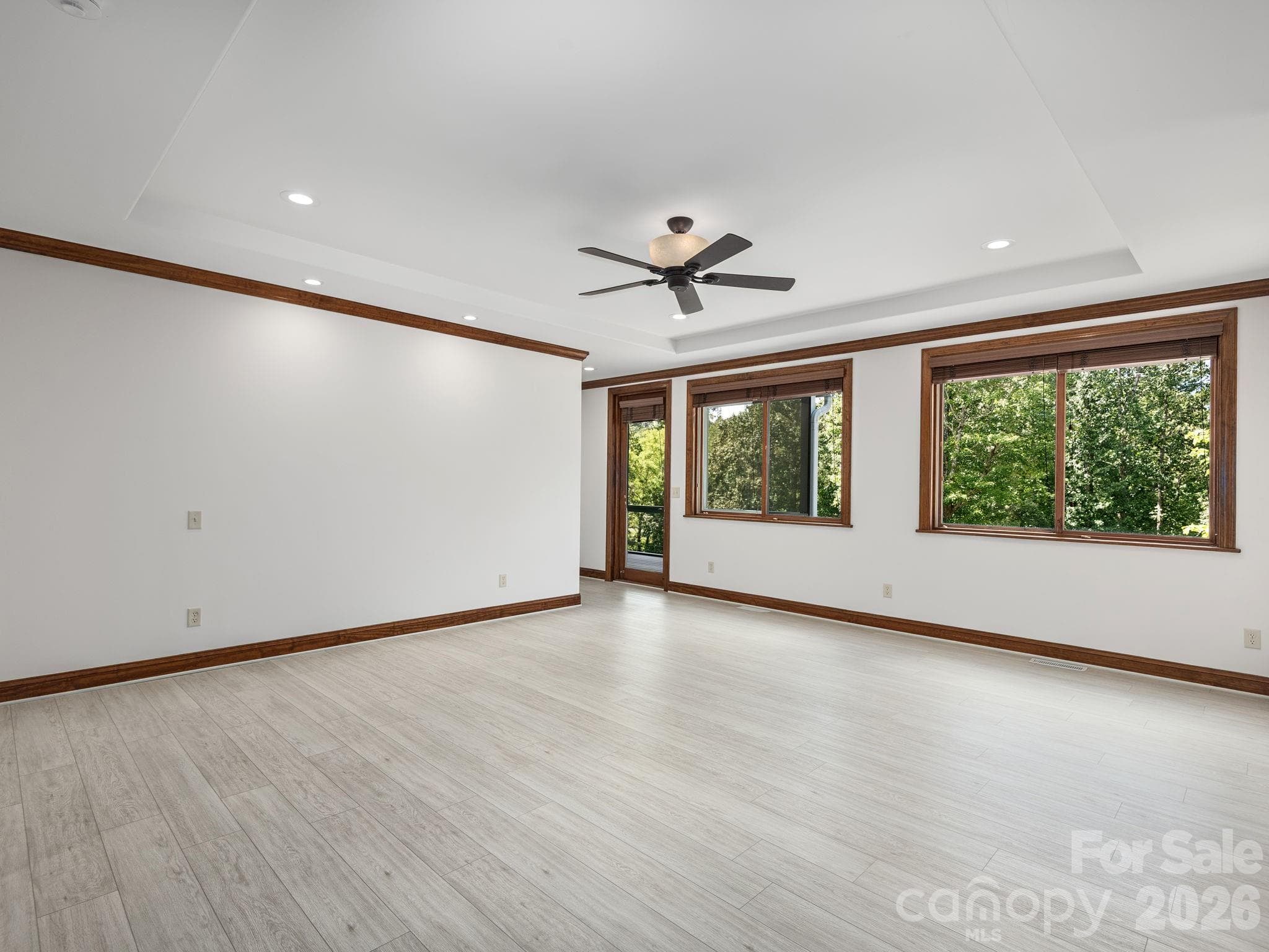 Primary Bedroom on Main Level w/access to screen porch. - 248 Wisdom Cove Road, Flat Rock