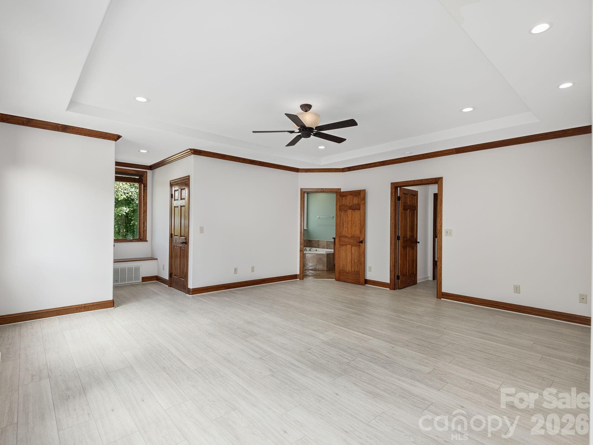 Primary Bedroom w/Ensuite. Access to screen porch. - 248 Wisdom Cove Road, Flat Rock