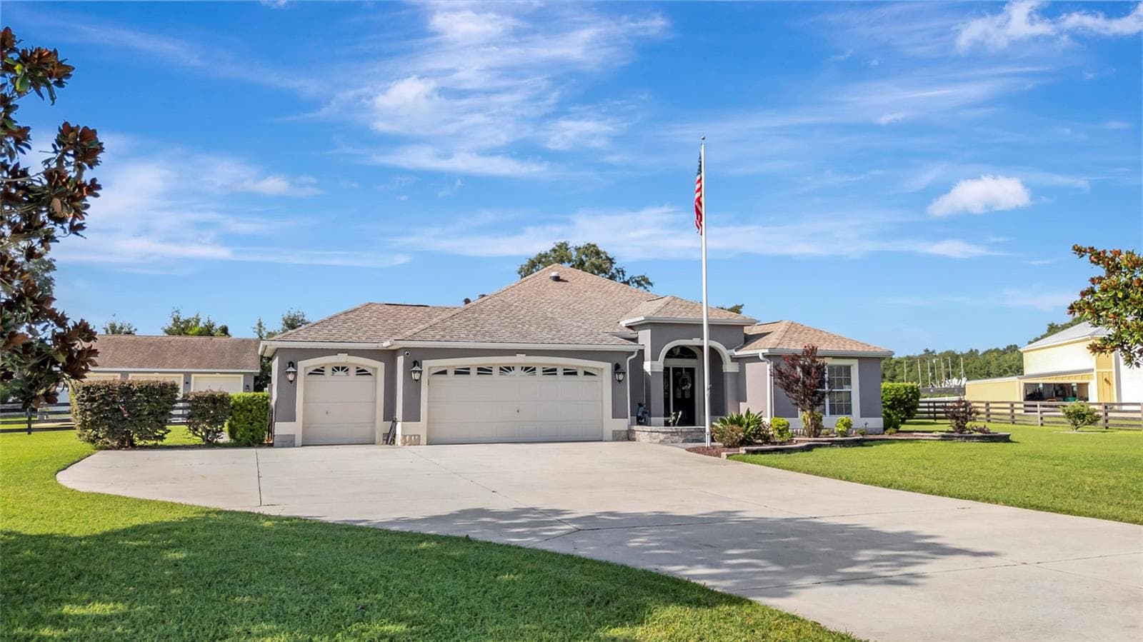 2 bay Garage with Golf Cart storage. - 4190 COUNTY ROAD 121D, WILDWOOD