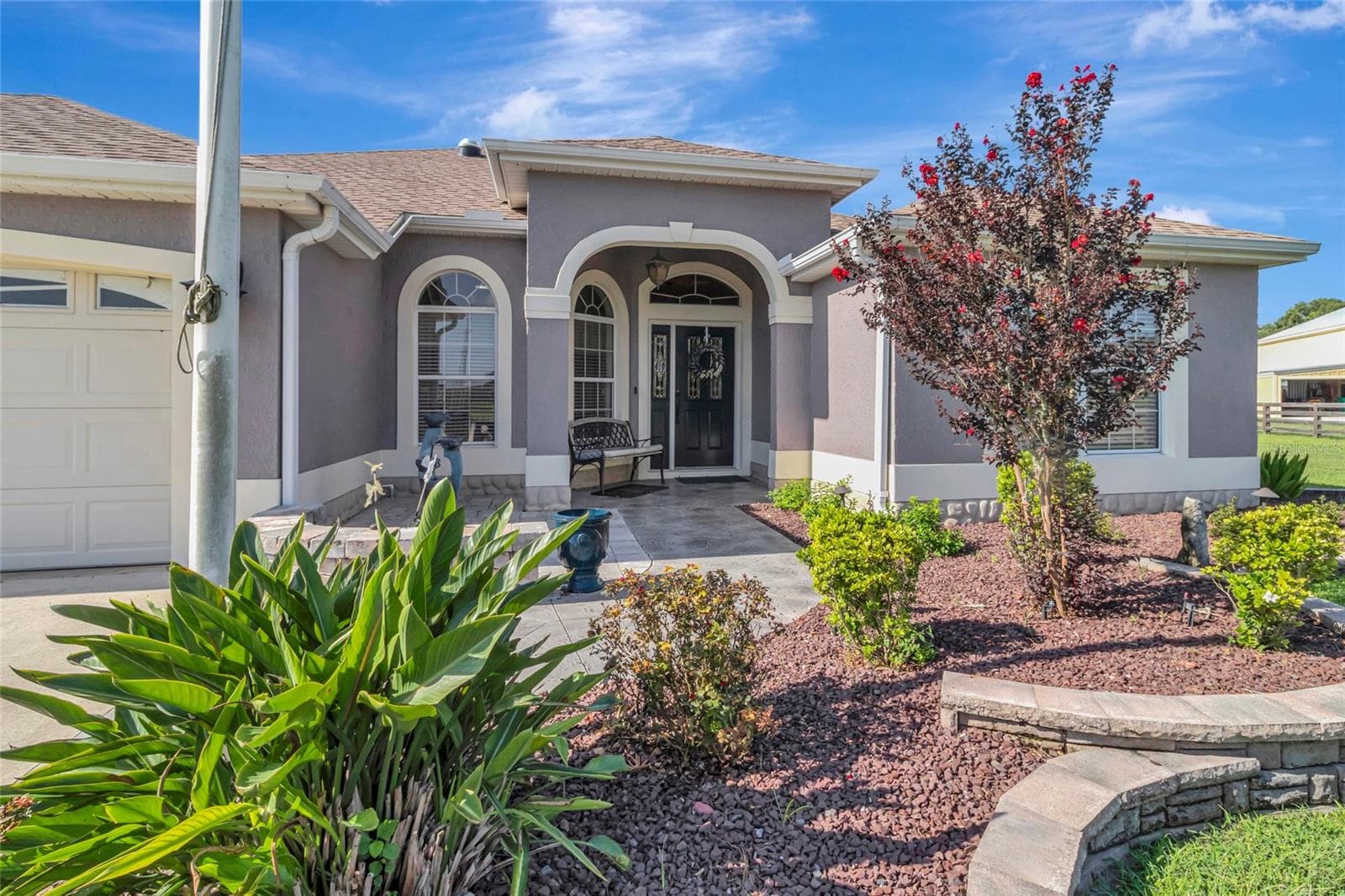 Perfectly manicured front entrance - 4190 COUNTY ROAD 121D, WILDWOOD