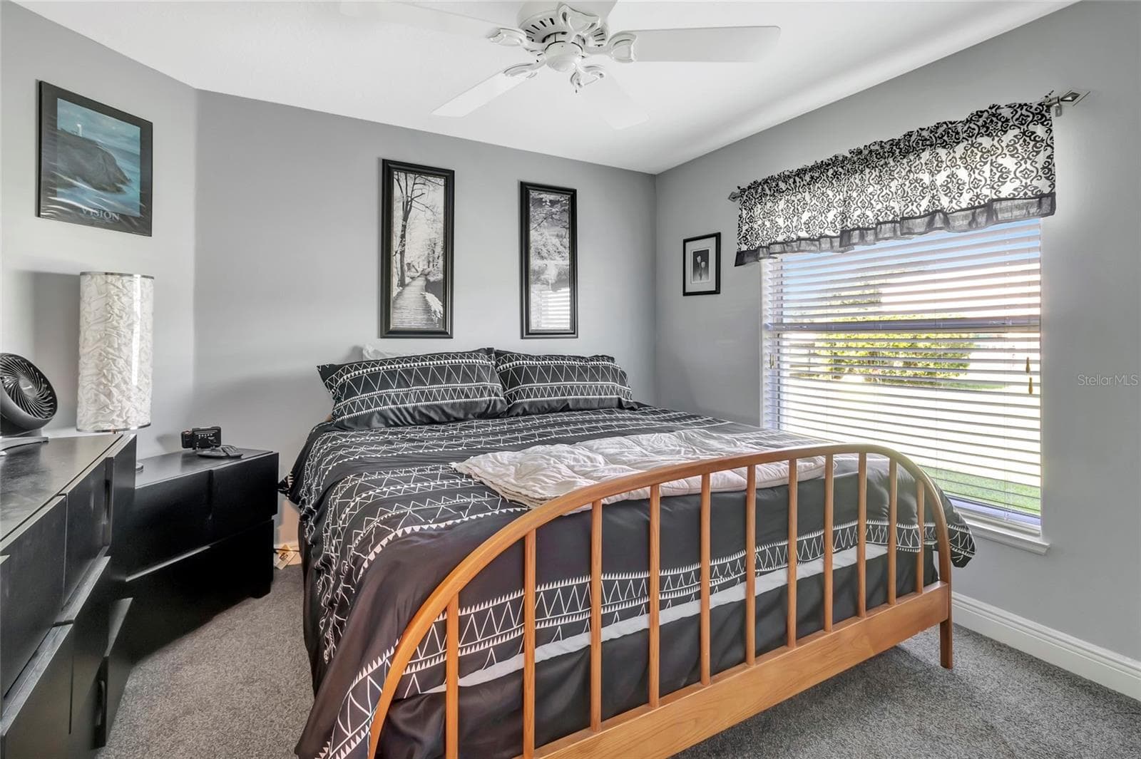 2 guest bedroom with enough space for a queen size bed and plenty of natural light. - 4190 COUNTY ROAD 121D, WILDWOOD