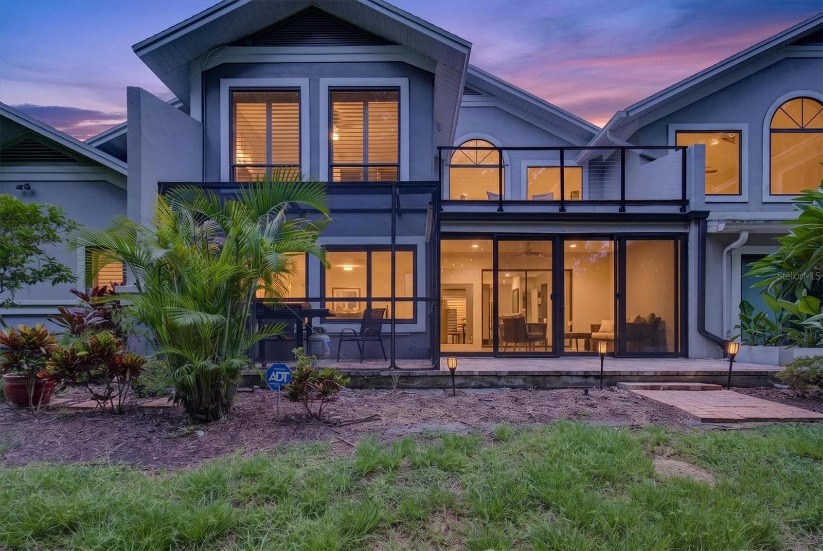 Back Patio Twilight - 2631 ROYAL LIVERPOOL DR, TARPON SPRINGS