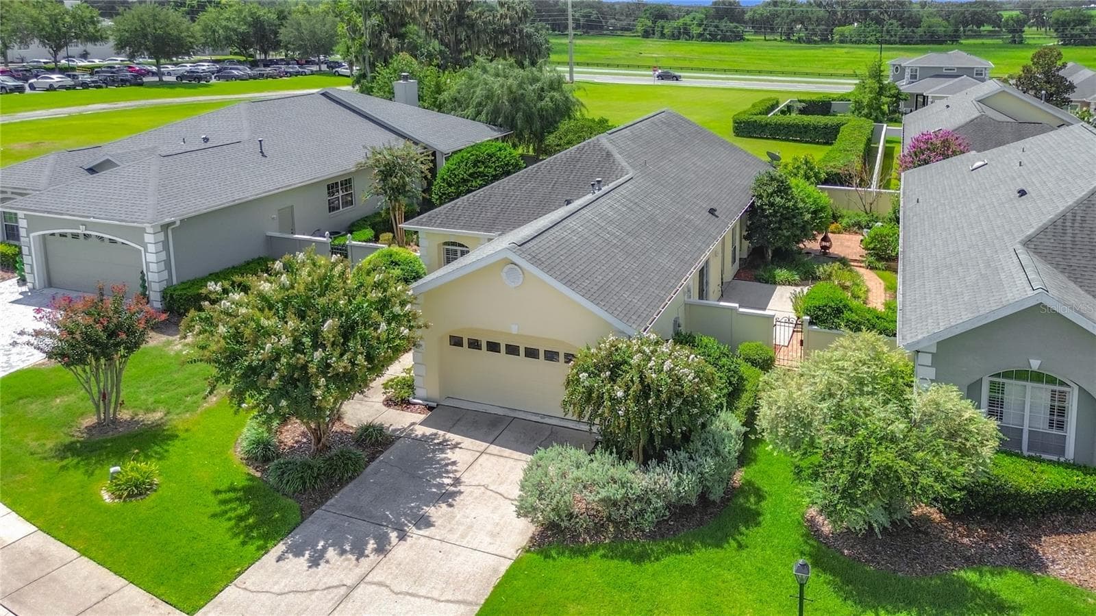 Beautiful landscaping and private side and back yard including a side patio and a pack patio. - 3008 SW 41ST PL, OCALA
