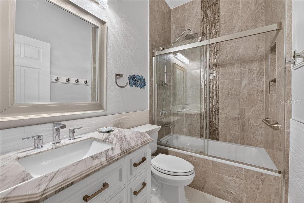 guest bath - 5 CAPTIVA AT LIONSPAW, DAYTONA BEACH