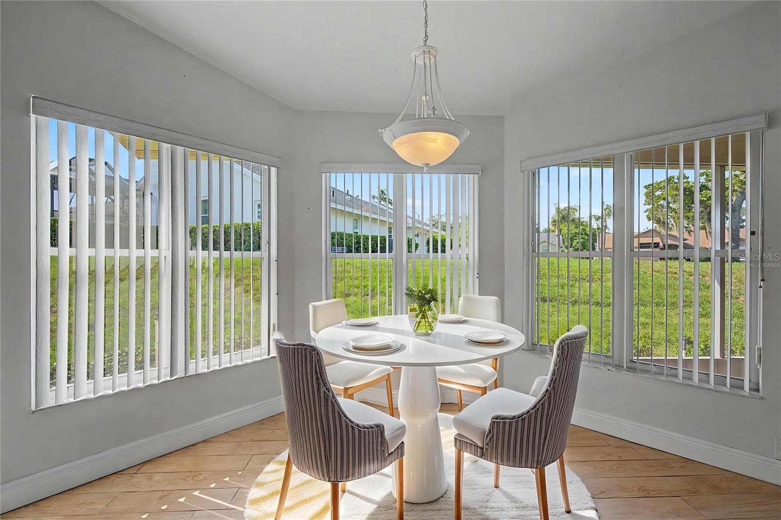 Breakfast nook virtually staged - 8919 KEATS DR, HUDSON