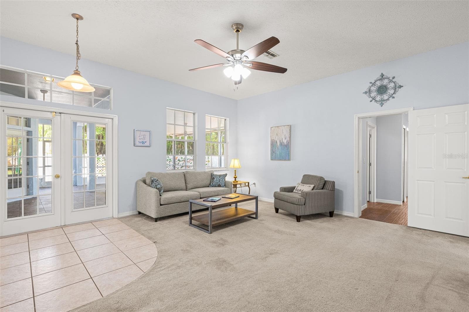 Family room and breakfast nook toward patio - 7904 OREGOLD DR, NEW PORT RICHEY