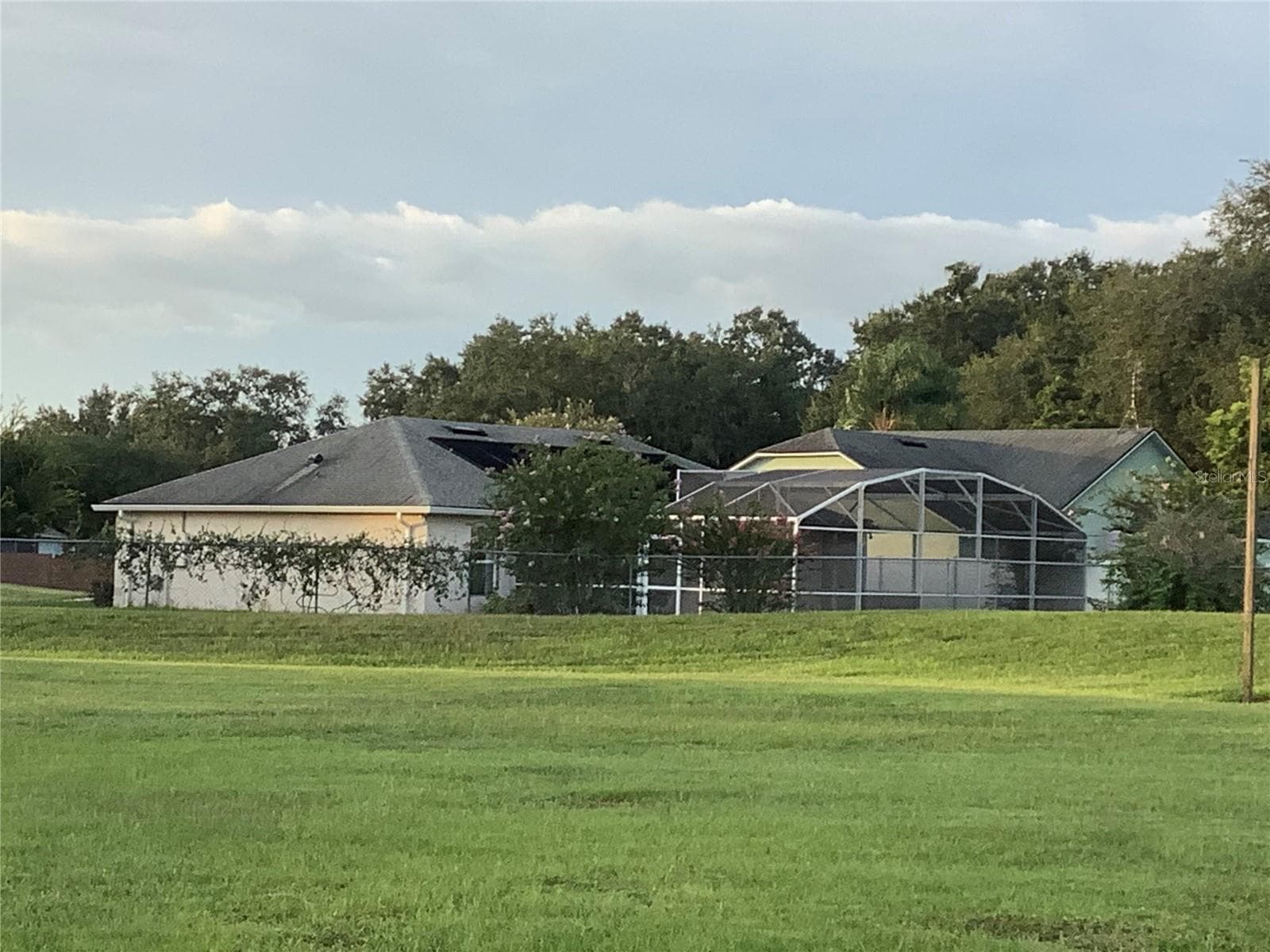 Back of house taken from Veterans Park - 665 STEVELYNN CIR, WINTER GARDEN