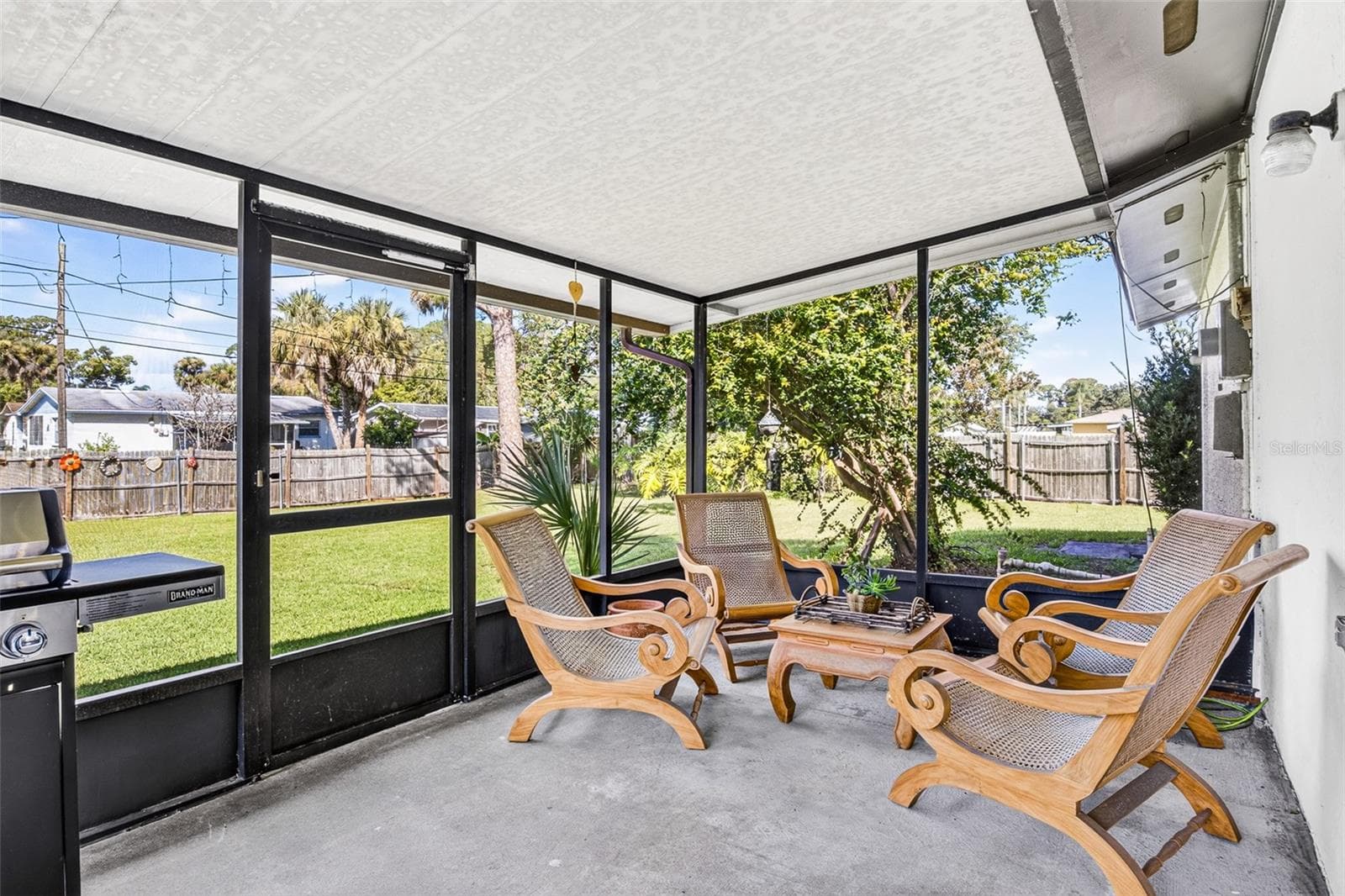 screened in patio - 2530 NORDMAN AVE, NEW SMYRNA BEACH