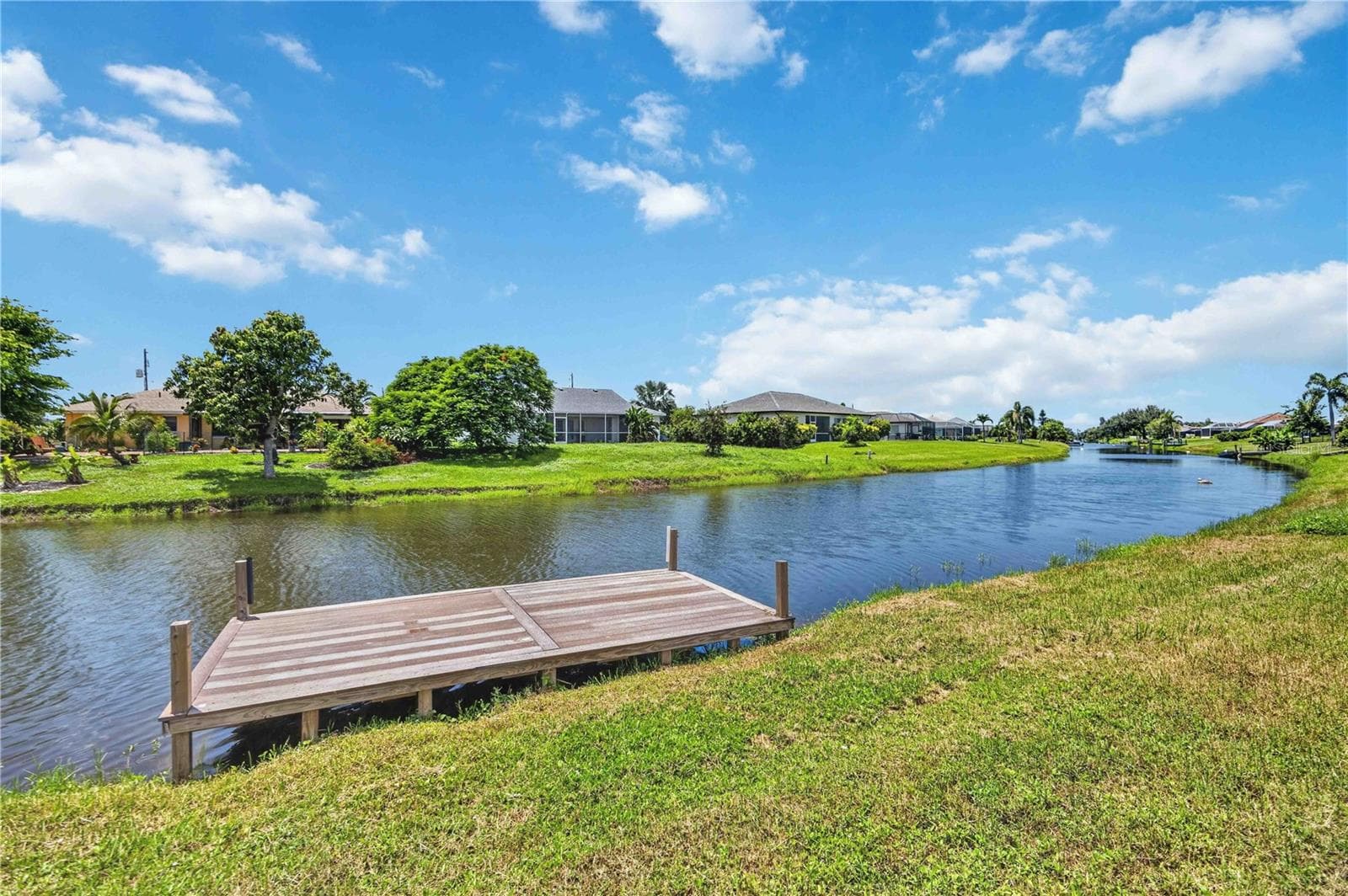 Private Dock Perfect for Morning Coffee, Afternoon Casts or Sunset Toasts! - 166 MARK TWAIN LN, ROTONDA WEST