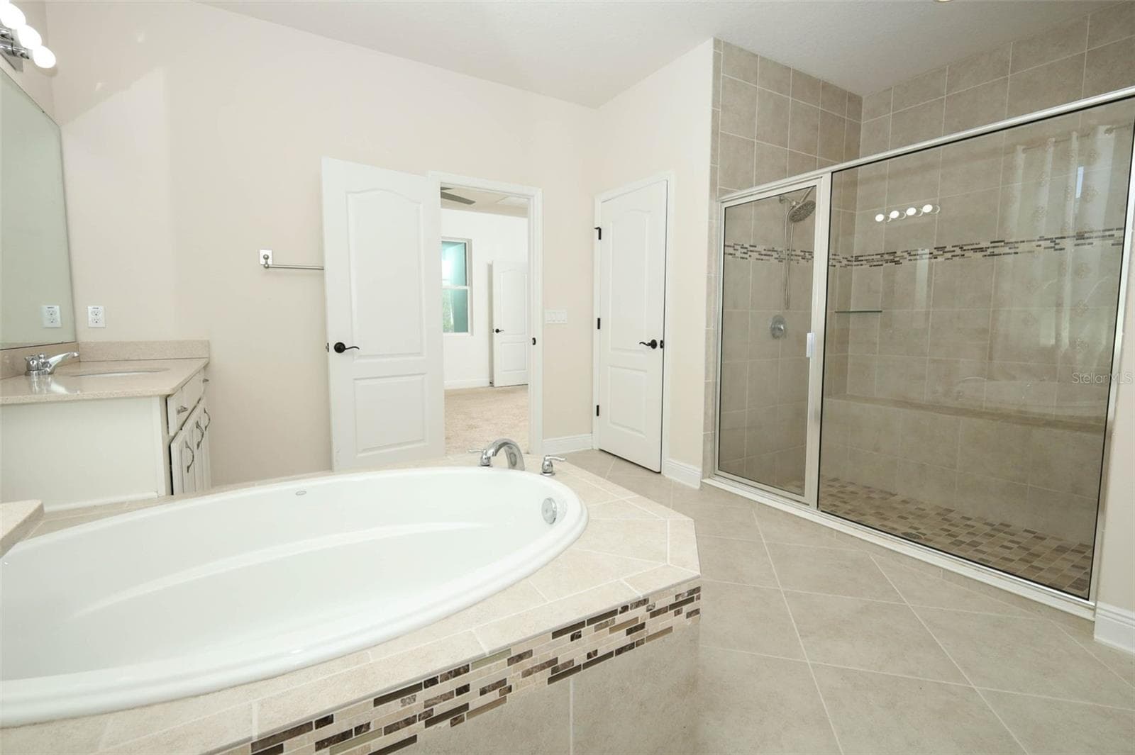 MASTER BATHROOM - 12397 STONE BARK TRL, ORLANDO