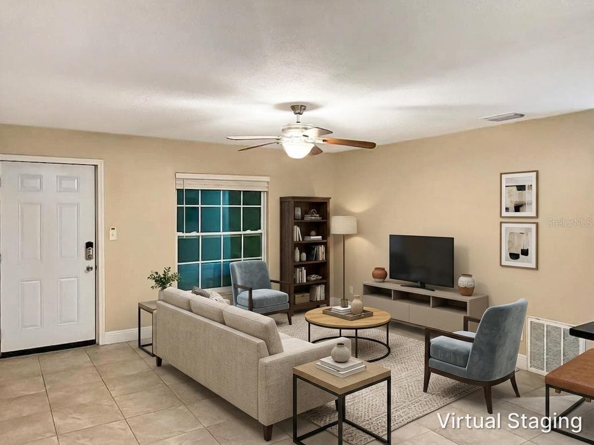 Staged living Room - 2800 E 113TH AVE #213, TAMPA