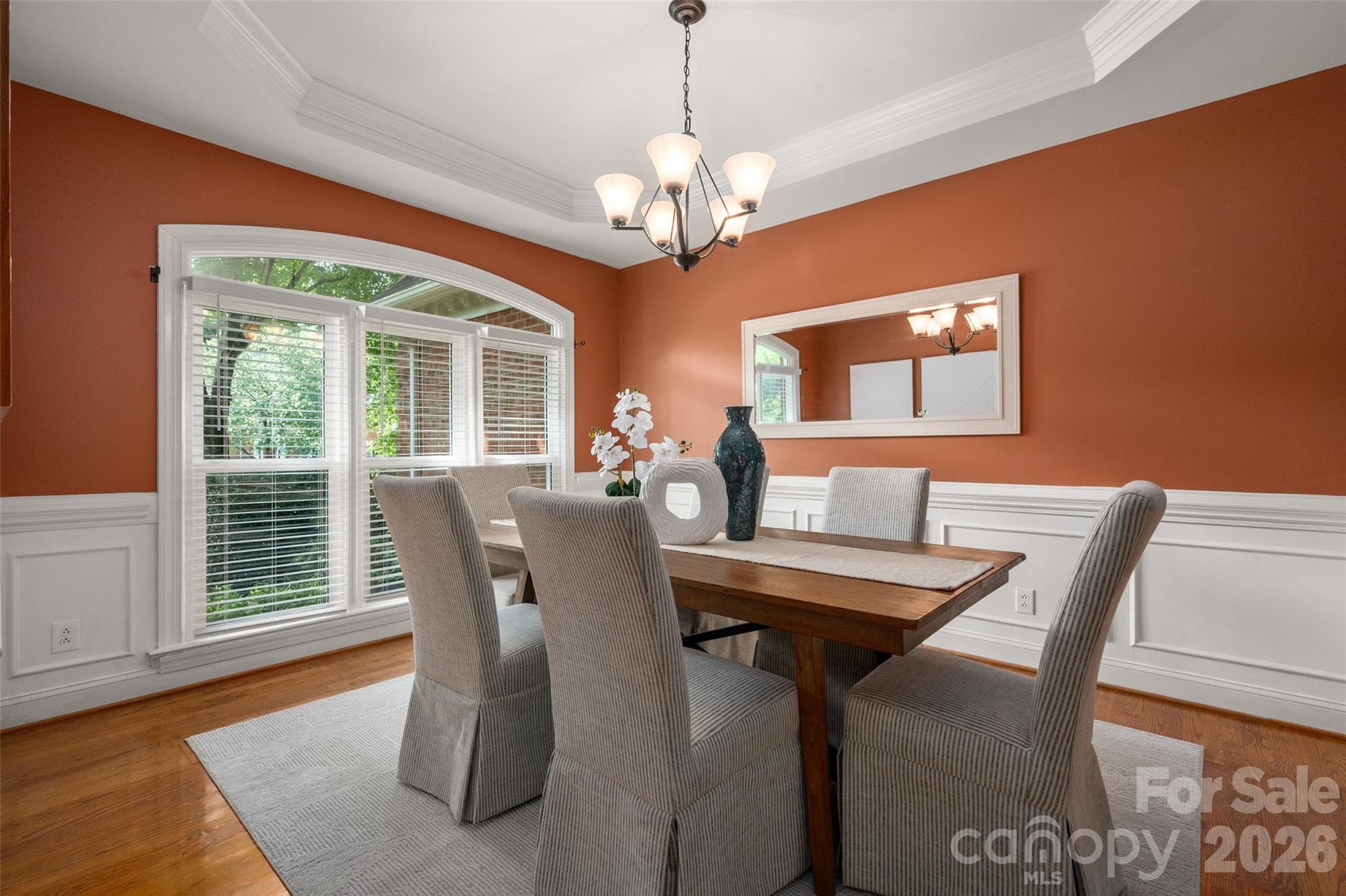 Spacious dining room with tray ceiling. - 12818 Darby Chase Drive, Charlotte