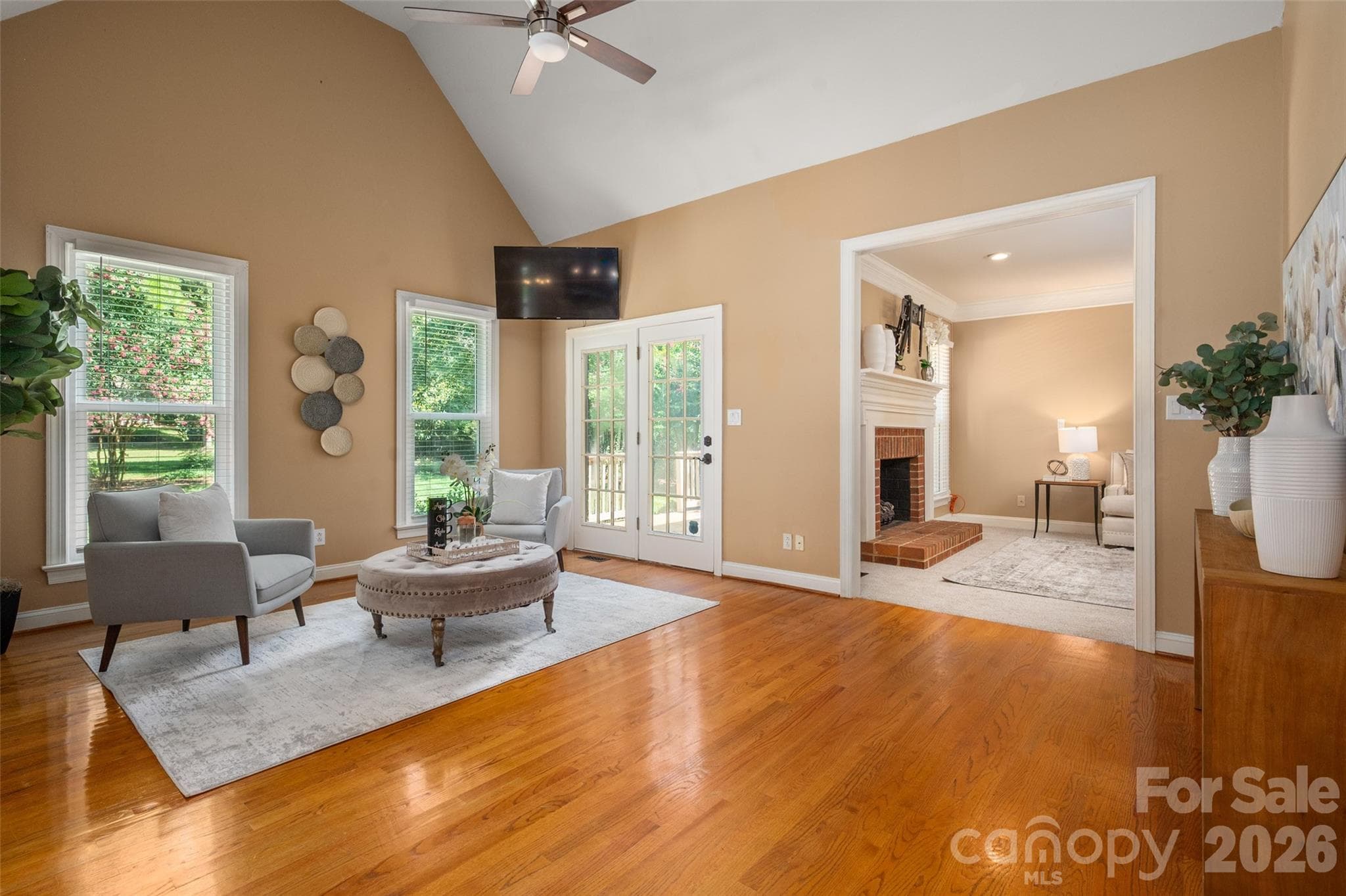 The keeping room off the kitchen adds wonderful space for entertaining. - 12818 Darby Chase Drive, Charlotte