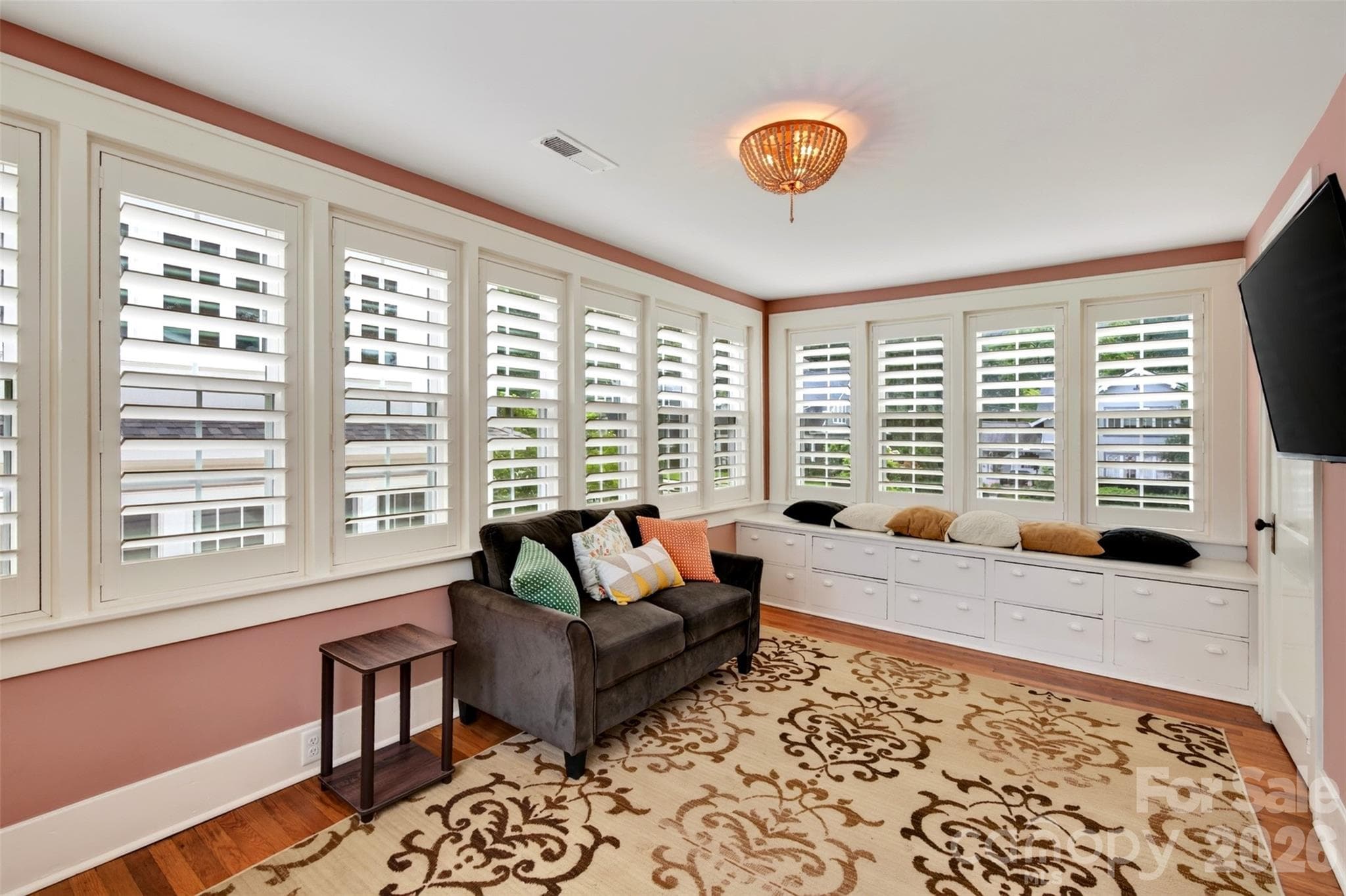 Upper level sun room with plantation shutters - 55 Edgemont Road, Asheville