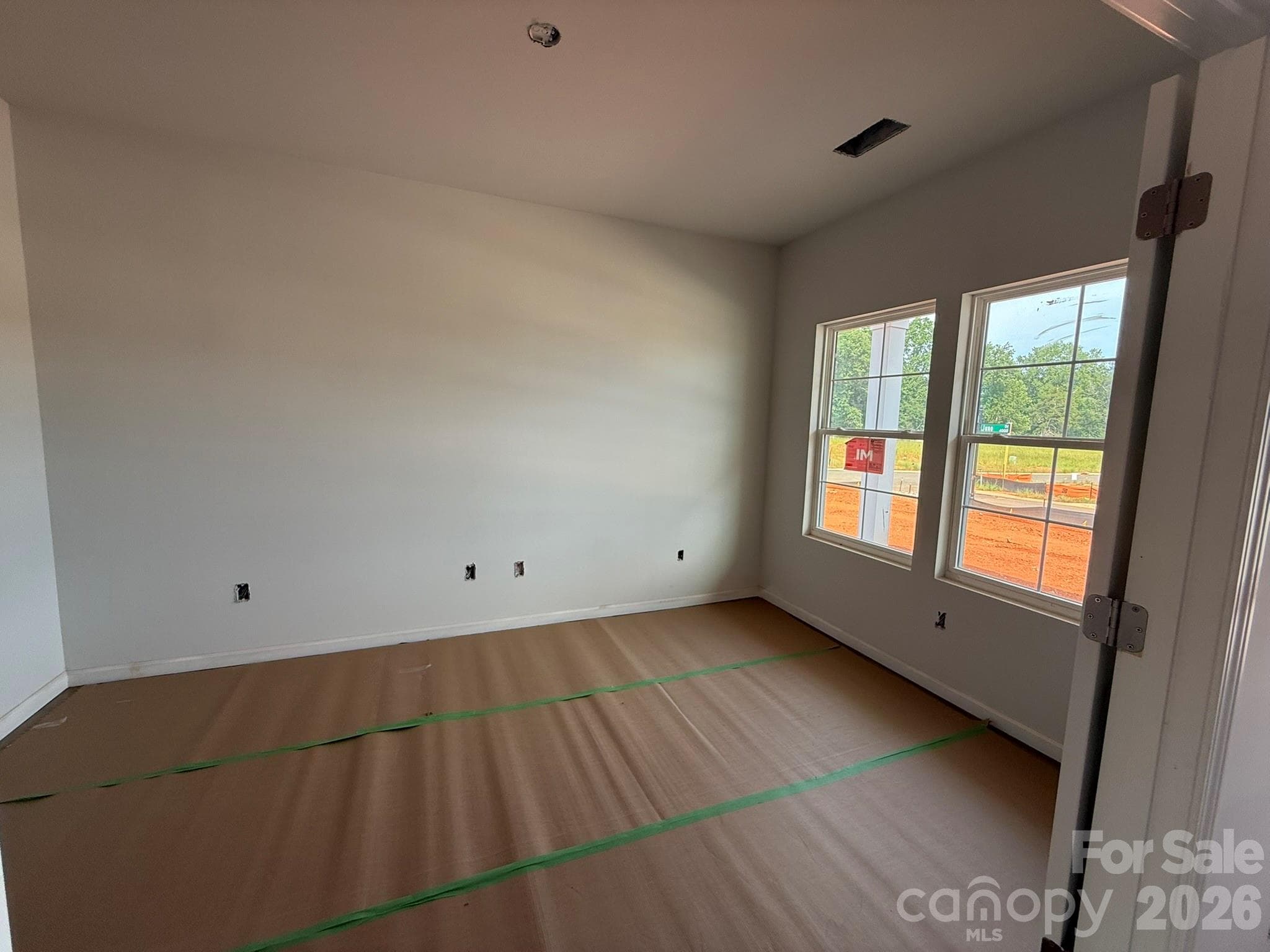 This home features a office on the main floor at entry way - Charlotte