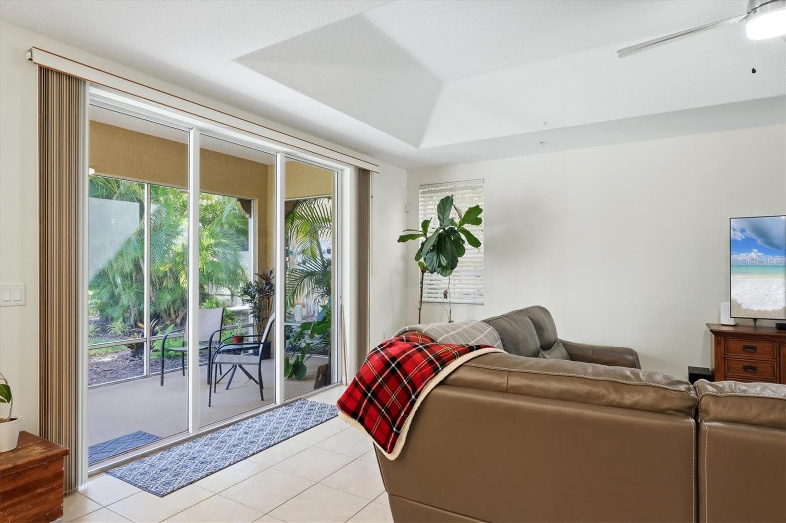 Slider leading to Lanai near LR - 3971 SQUARE EAST LN #8, SARASOTA