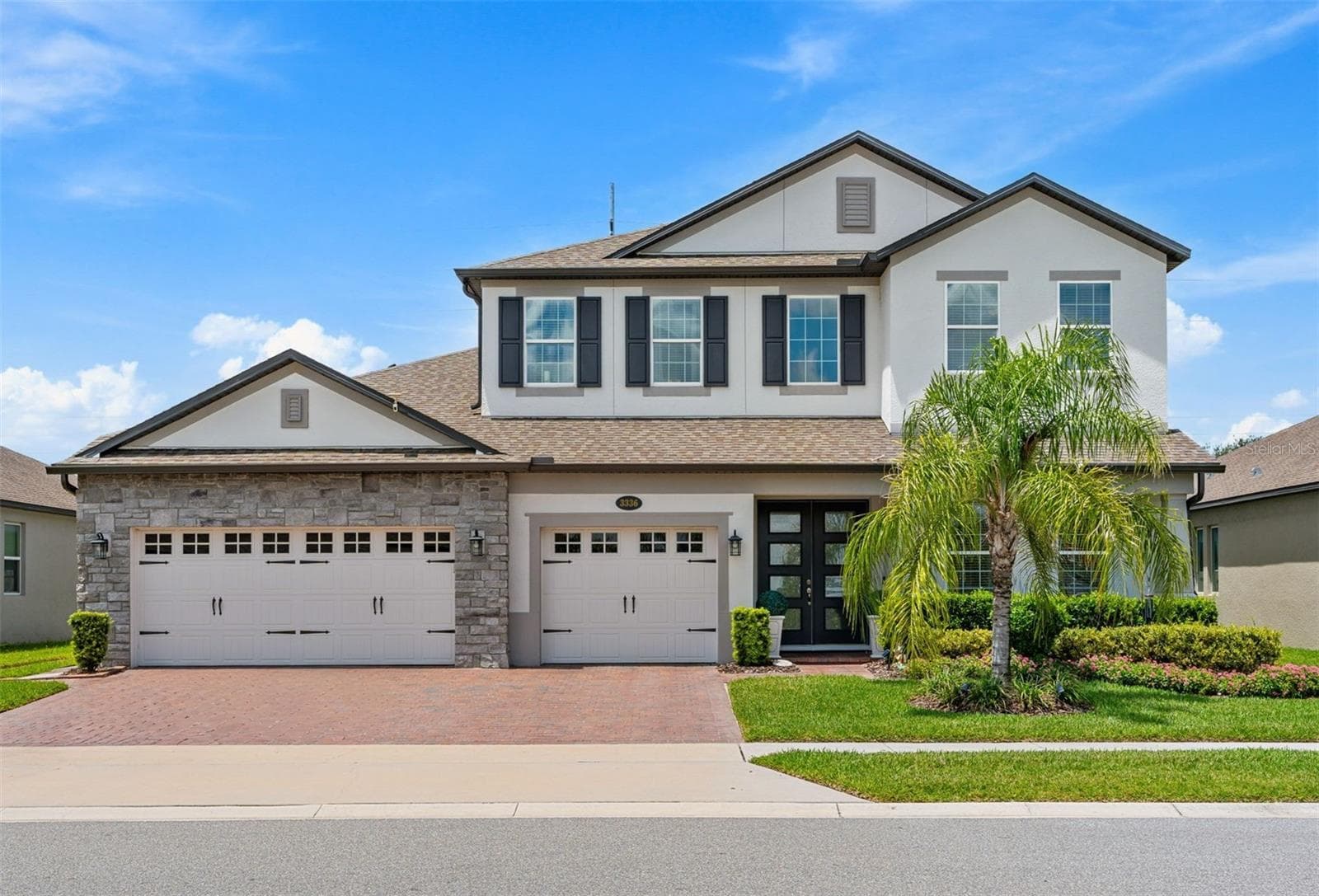 Built in 2022 and UPGRADED from top to bottom, this stunning 4-bedroom, 3.5-bath POOL HOME in the gated Red Ember North community delivers the look and feel of a model home with an exceptional Oviedo location! - 3336 LONE CYPRESS PT, OVIEDO