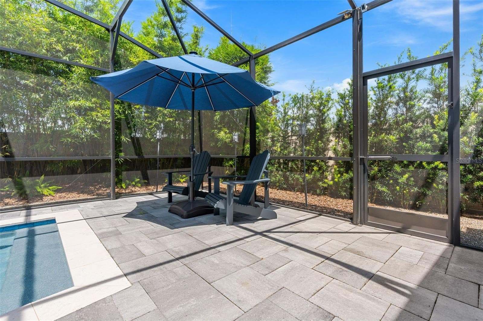 There are mutiple areas to relax or entertain poolside. - 3336 LONE CYPRESS PT, OVIEDO