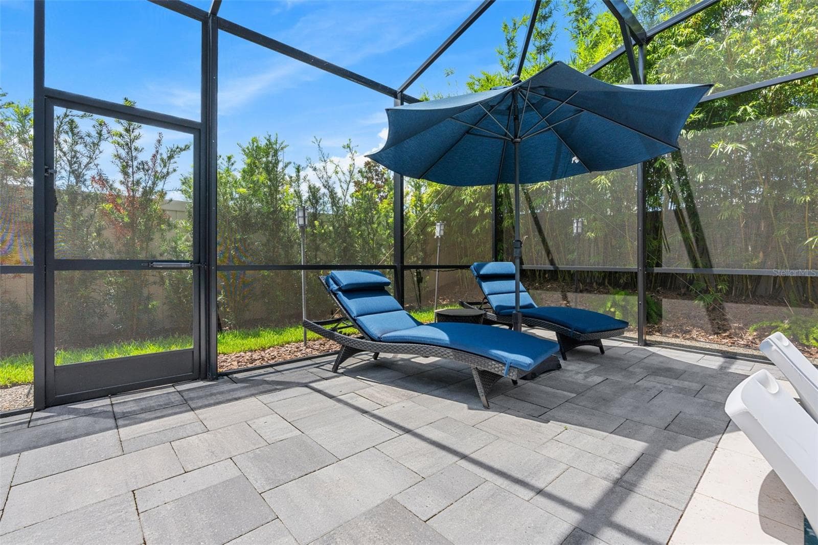 There are mutiple areas to relax or entertain poolside. - 3336 LONE CYPRESS PT, OVIEDO