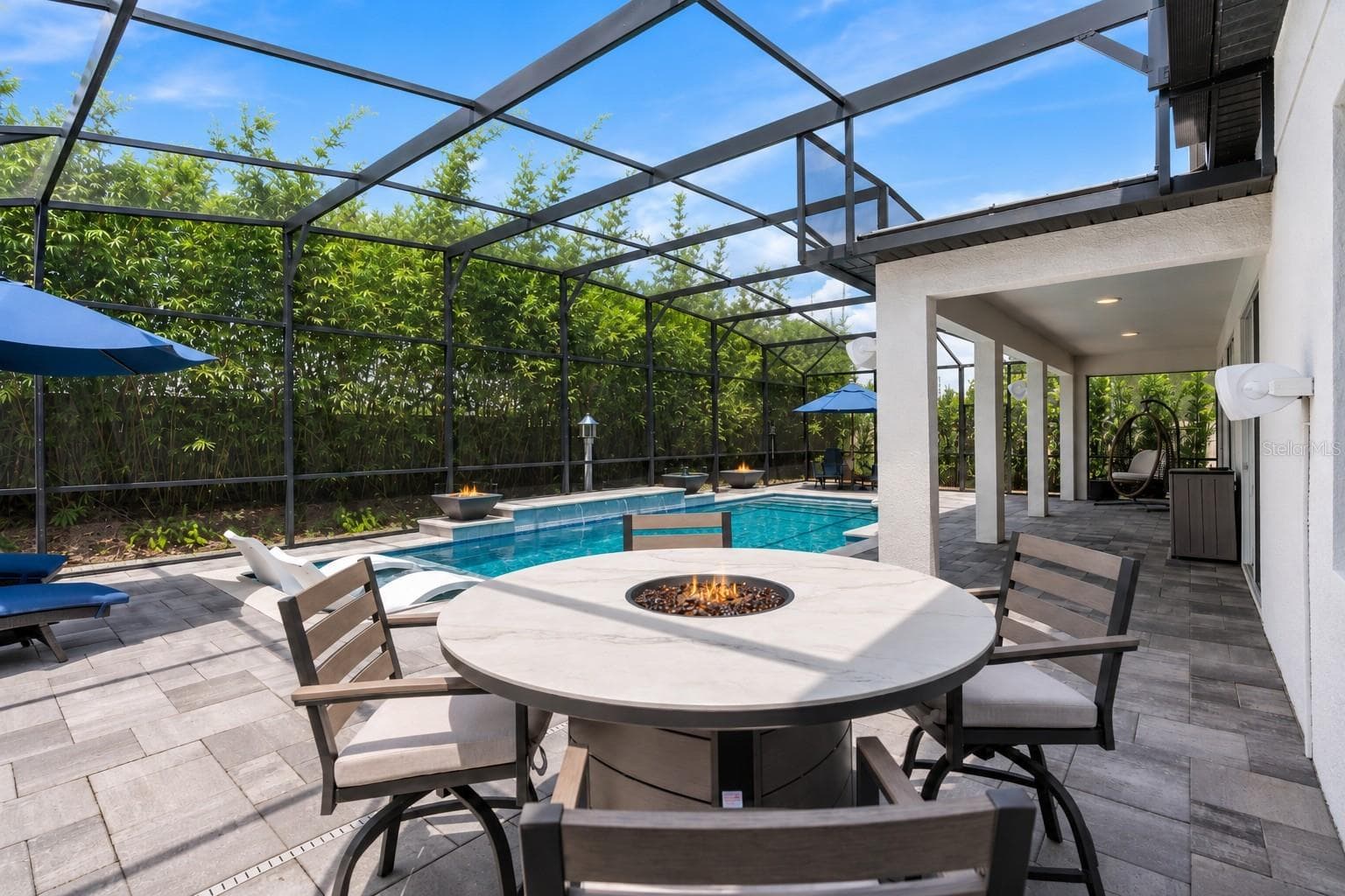 There are mutiple areas to relax or entertain poolside. - 3336 LONE CYPRESS PT, OVIEDO