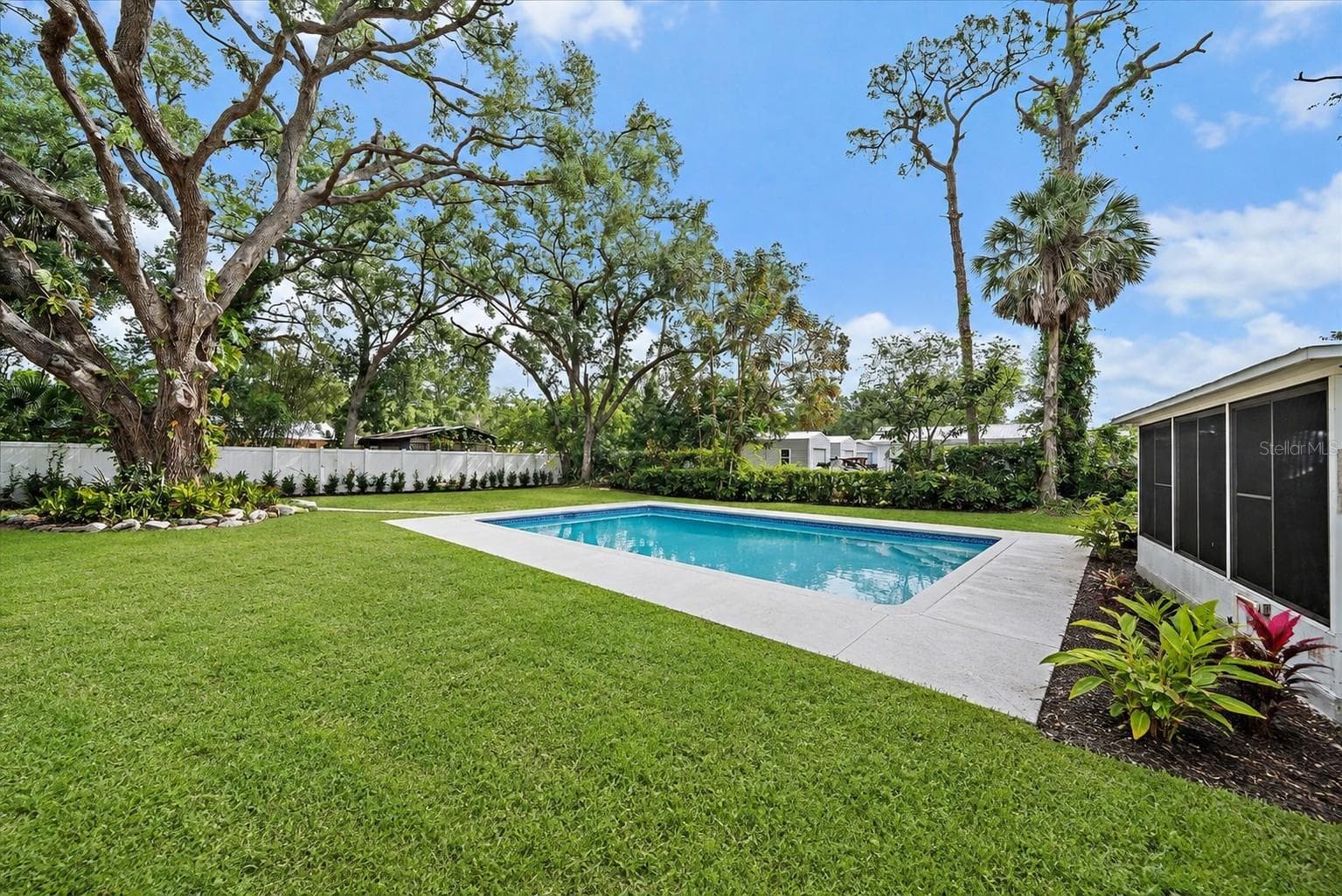 Backyard reimagined with a pool & landscaping - 2503 53RD AVE W, BRADENTON
