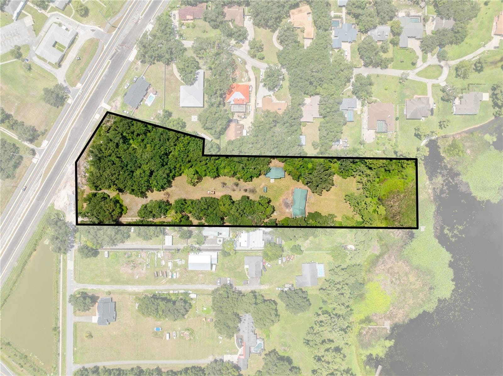 Aerial of approximate lot lines. Neptune Road is on the left. - 2557 AMES HAVEN RD, KISSIMMEE