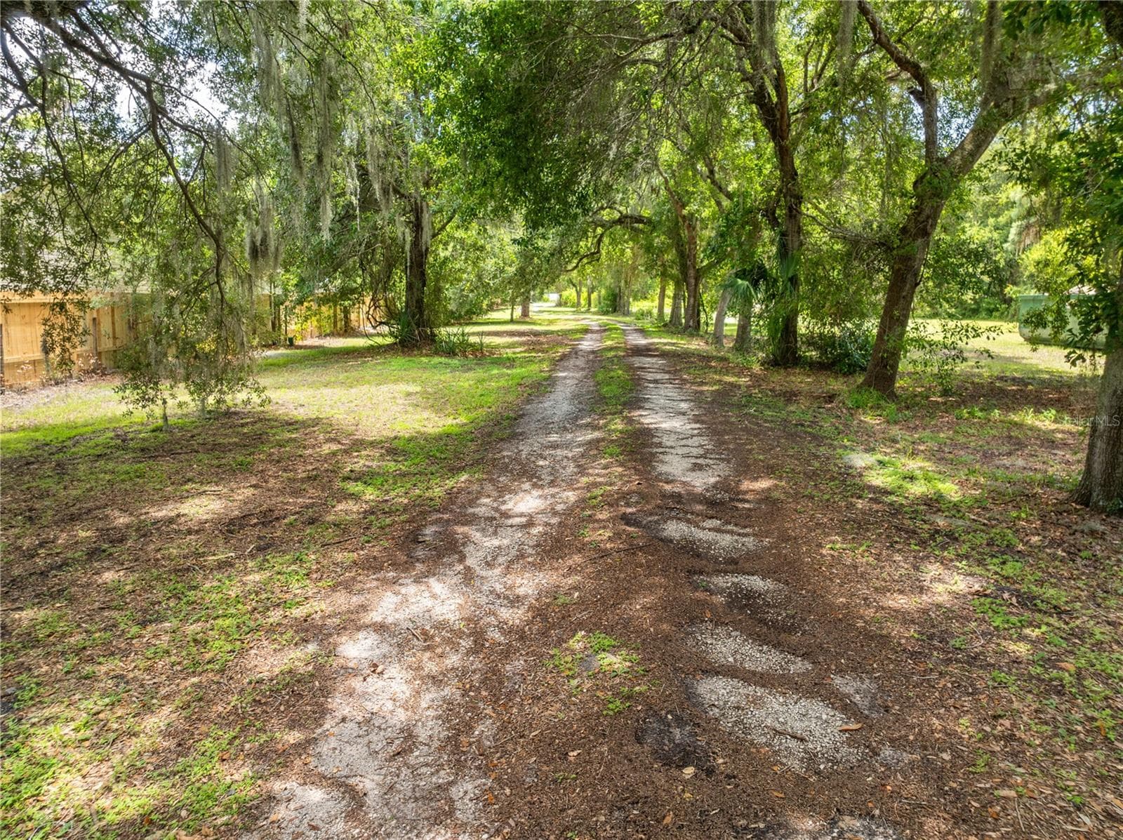 View of the property entrance as you leave. - 2557 AMES HAVEN RD, KISSIMMEE