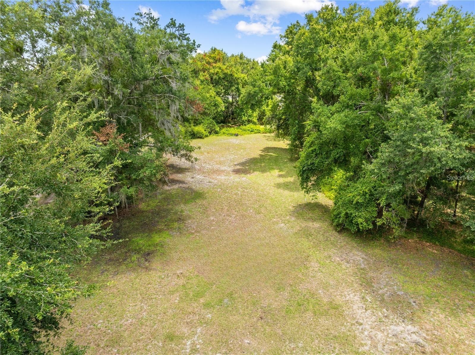 Front portion of the property looking towards the back. - 2557 AMES HAVEN RD, KISSIMMEE