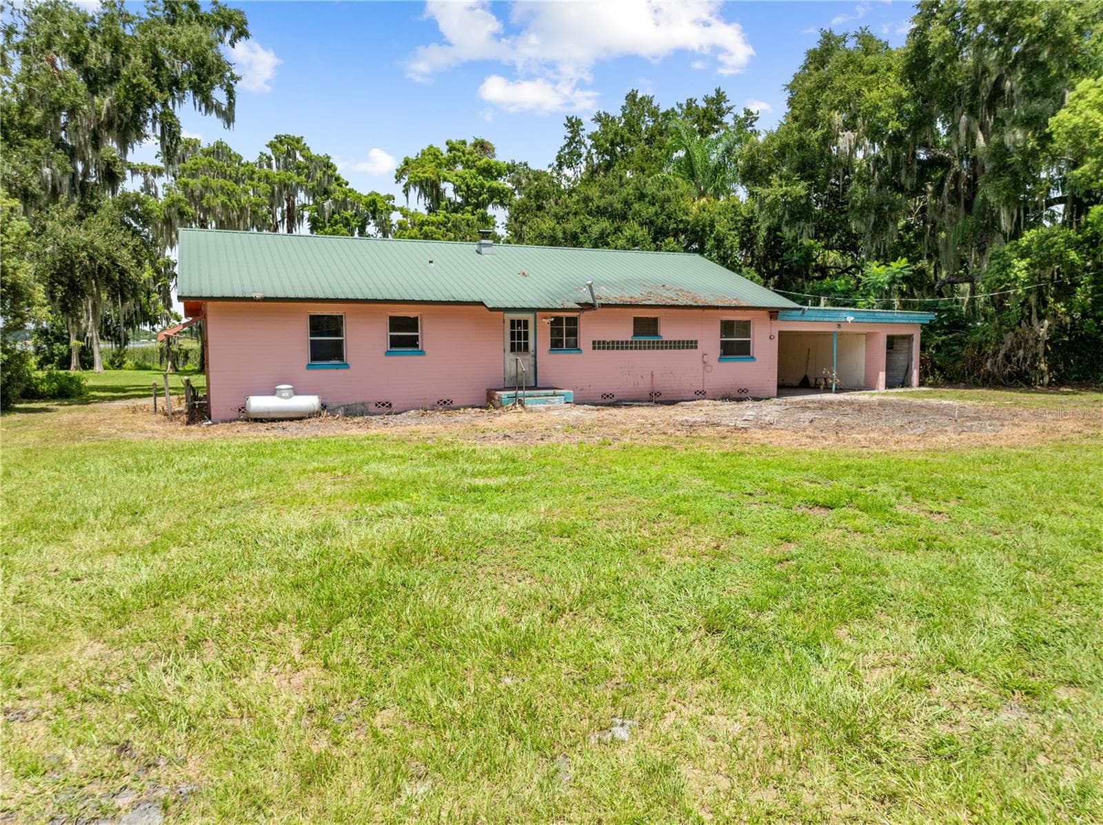 Back Exterior of the home. - 2557 AMES HAVEN RD, KISSIMMEE