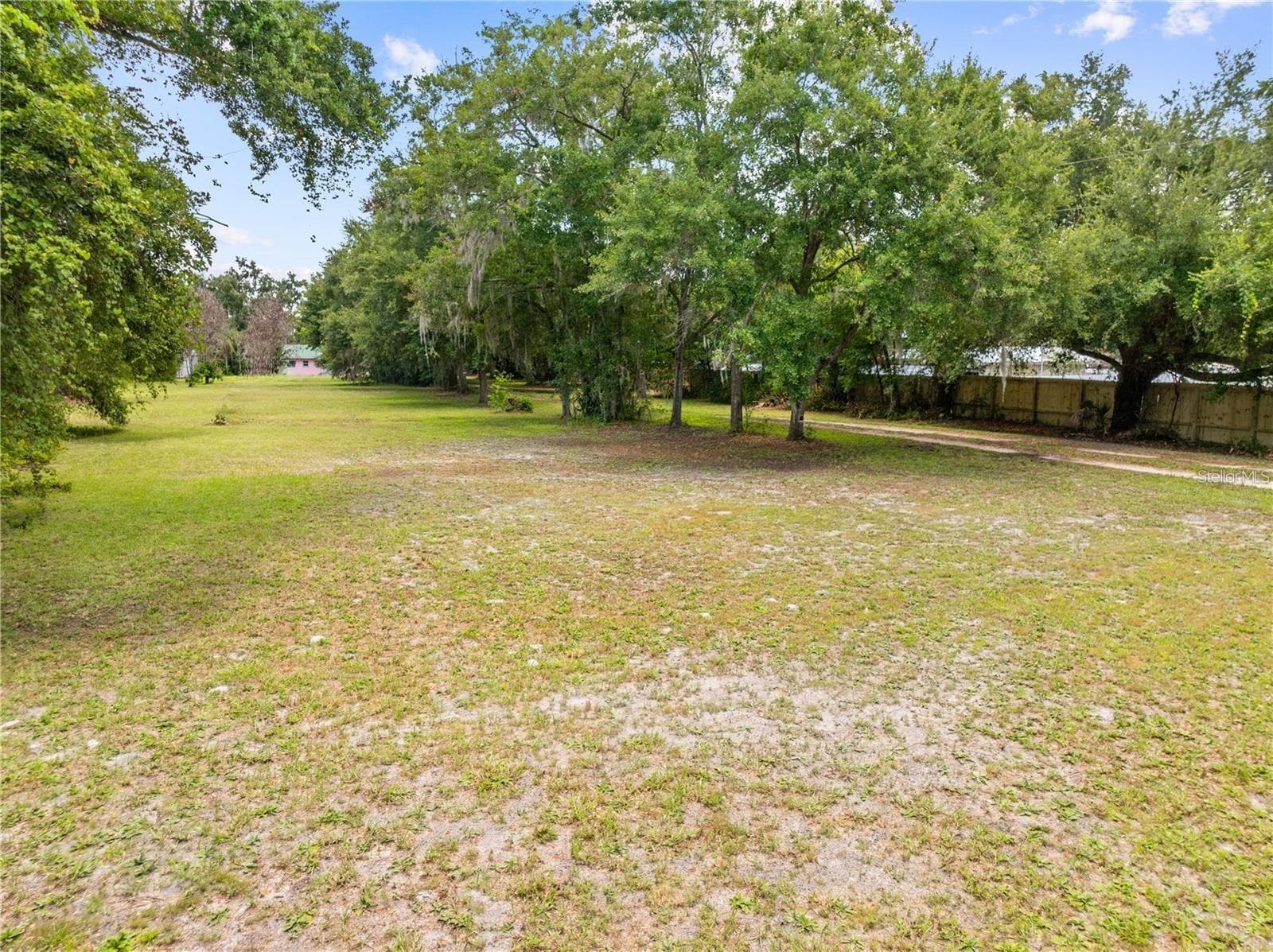 Front portion of the property looking towards the back. - 2557 AMES HAVEN RD, KISSIMMEE