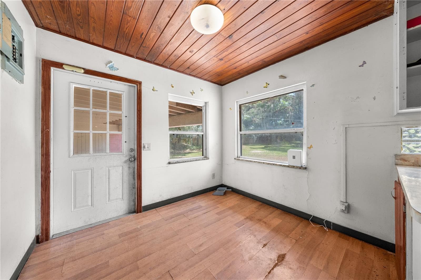 Entrance from the carport leading into the kitchen. - 2557 AMES HAVEN RD, KISSIMMEE