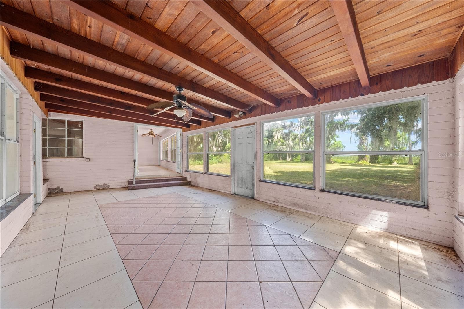 Sunroom that overlooks the lake. - 2557 AMES HAVEN RD, KISSIMMEE