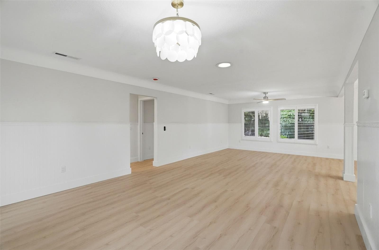 Living Room / Dining Room - 15814 3RD ST E, REDINGTON BEACH