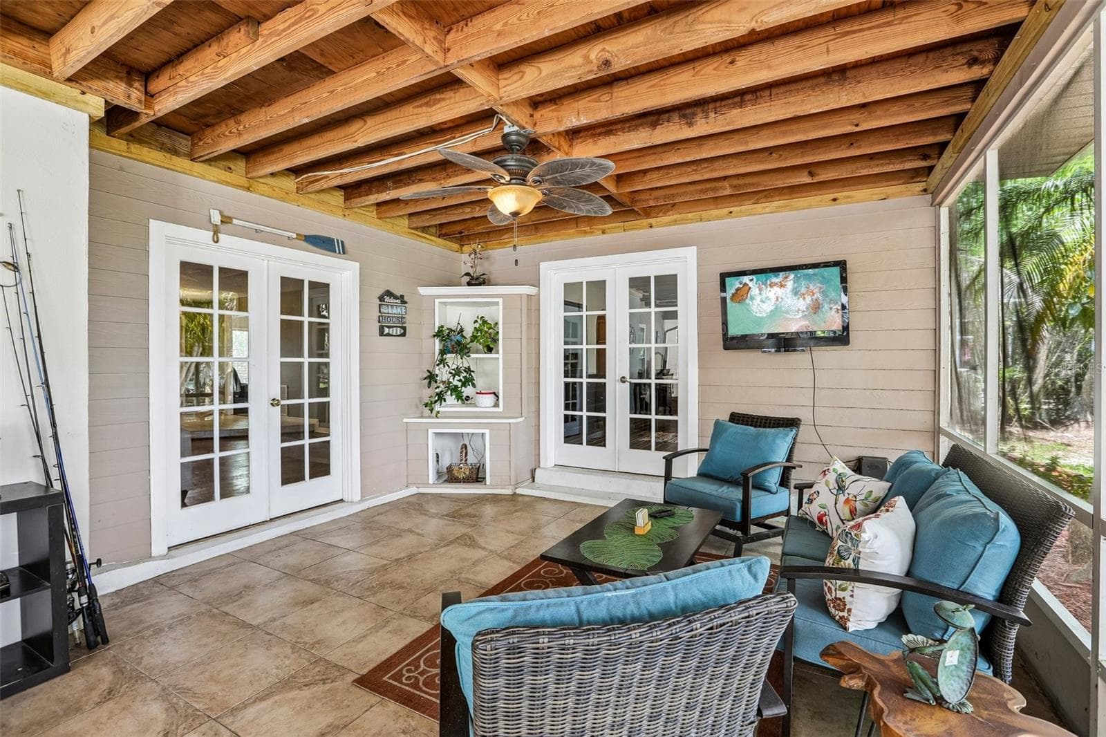 French doors to the living room and Primary bedroom - 3131 N CANAL DR, PALM HARBOR