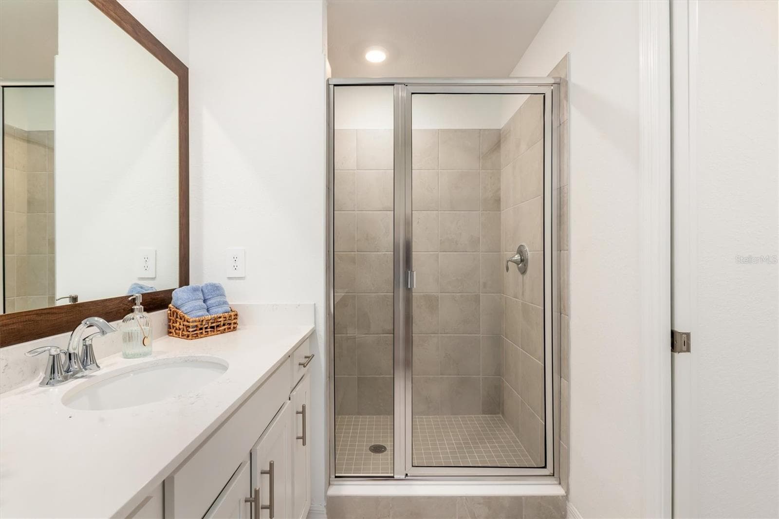 Primary Bath has walk-in shower. - 17625 OPAL SAND DR #307, VENICE