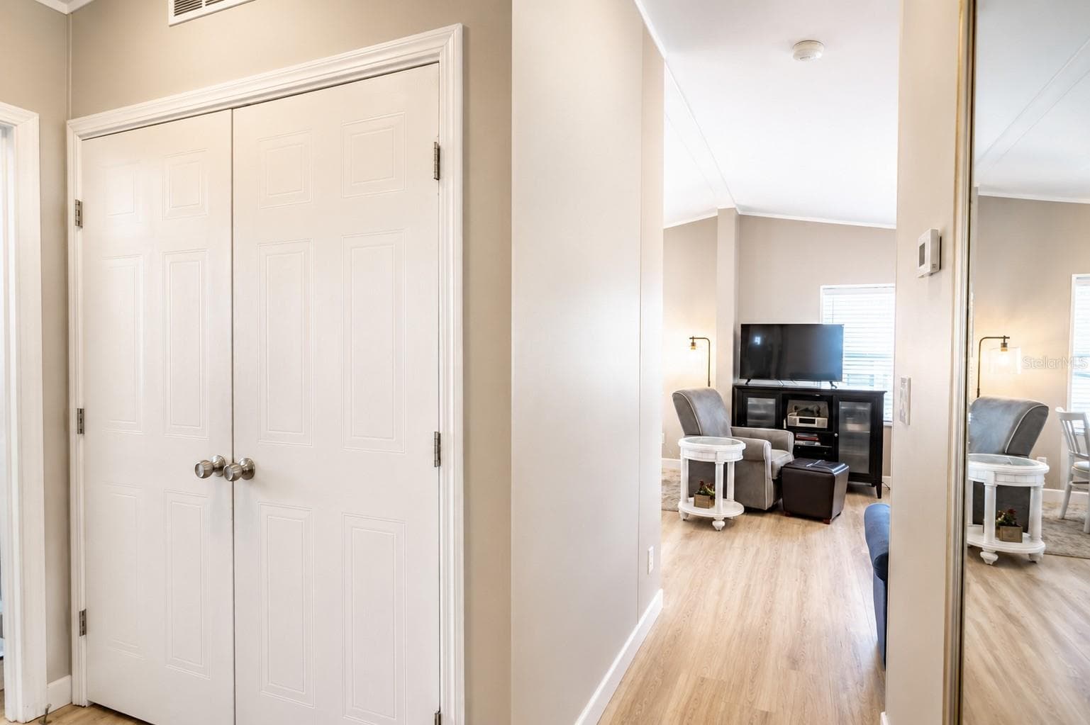 closet with washer and dryer - 8320 RIVERSIDE DR #51B, PUNTA GORDA