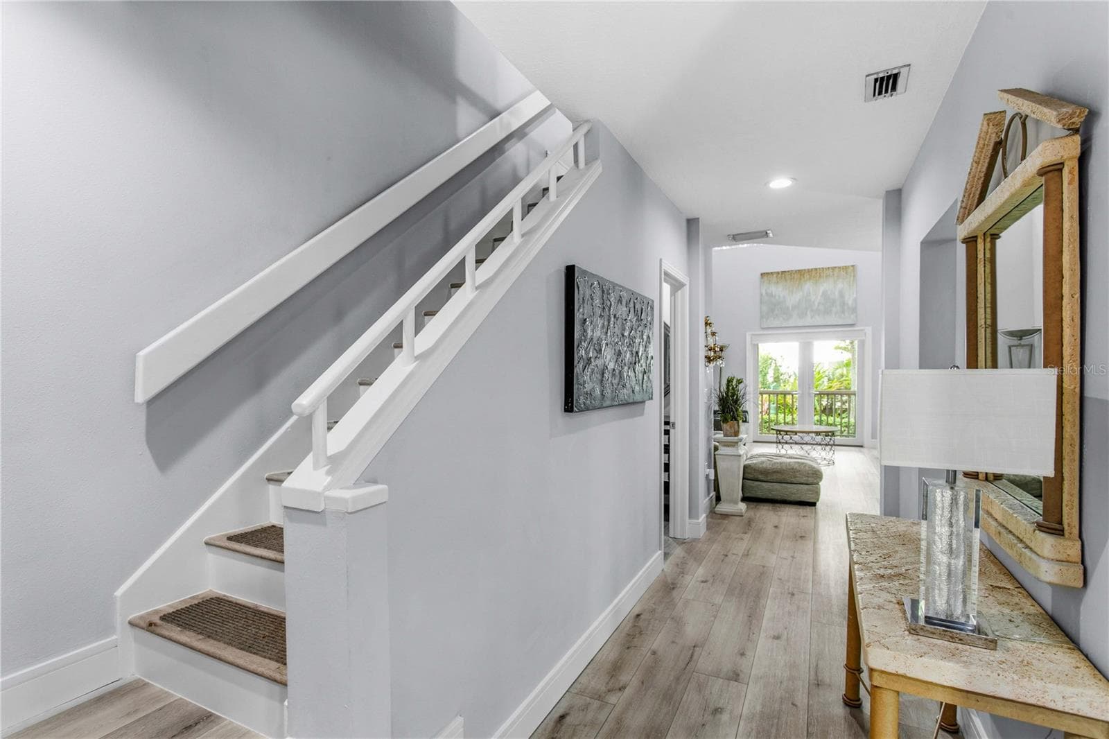 Upstairs, you’ll find two bedrooms along with a convenient laundry closet and linen closet. - 1116 SHIPWATCH CIR, TAMPA