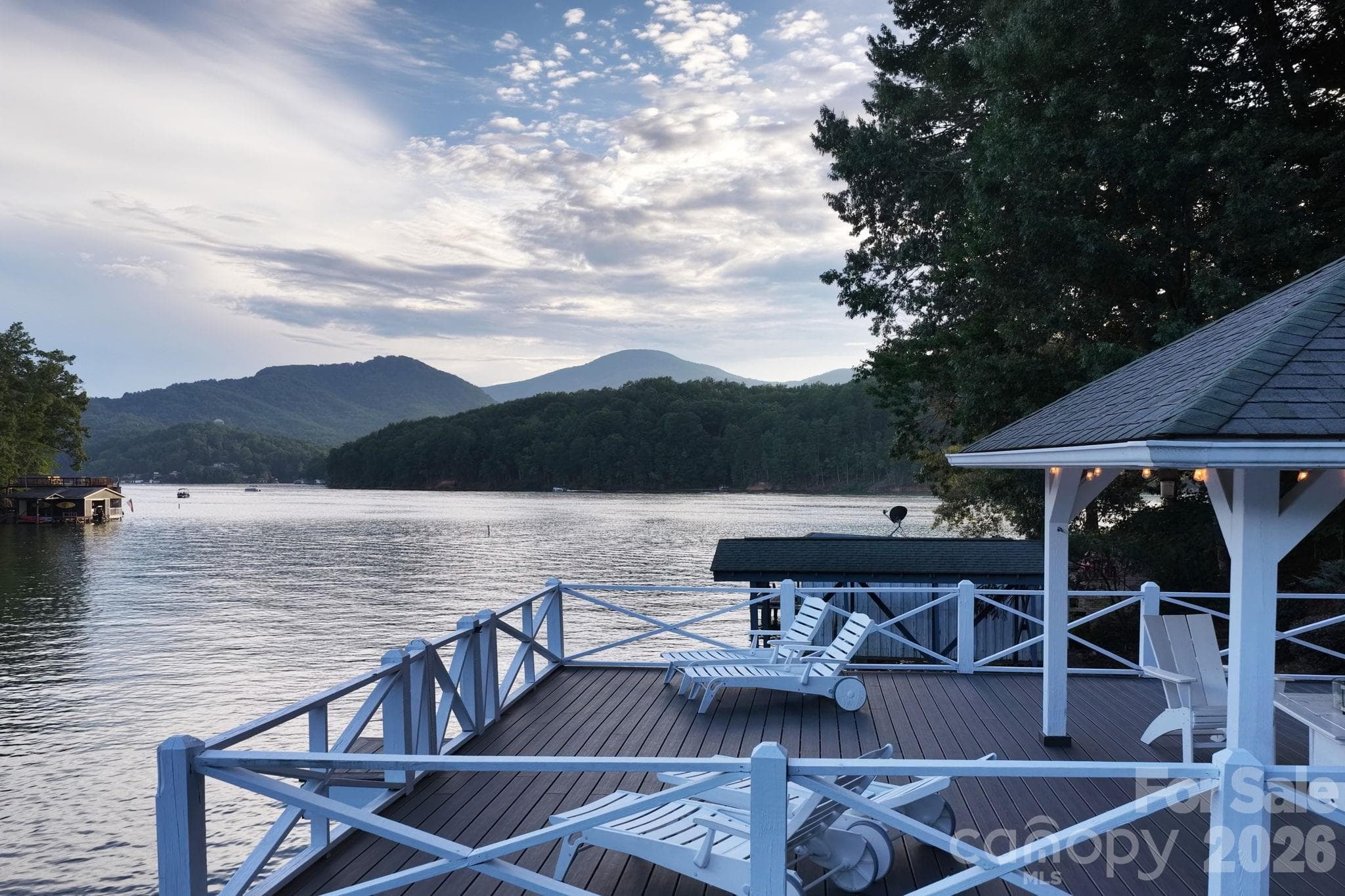 Property includes an expansive party deck, a private high dive, a covered gazebo. - 183 Blarney Road, Lake Lure