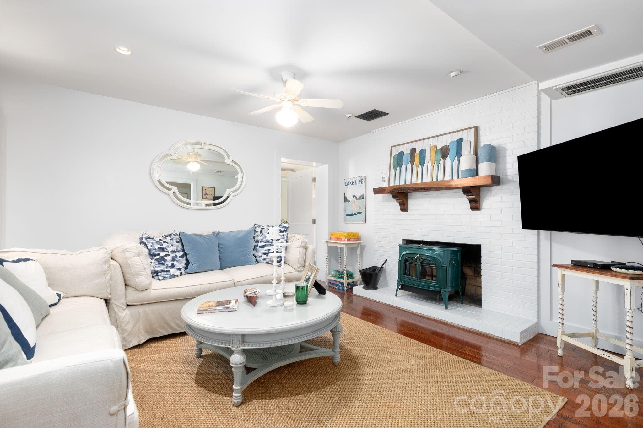 Living Room Features Vermont Castings Intrepid Flex Burn Wood burning stove - 183 Blarney Road, Lake Lure