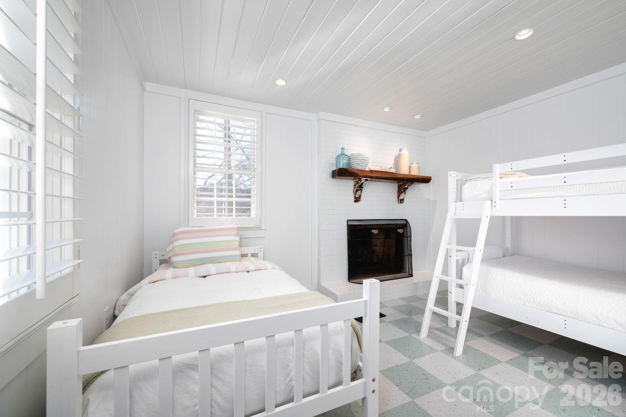 4th bedroom has wood burning fireplace and three single beds. - 183 Blarney Road, Lake Lure