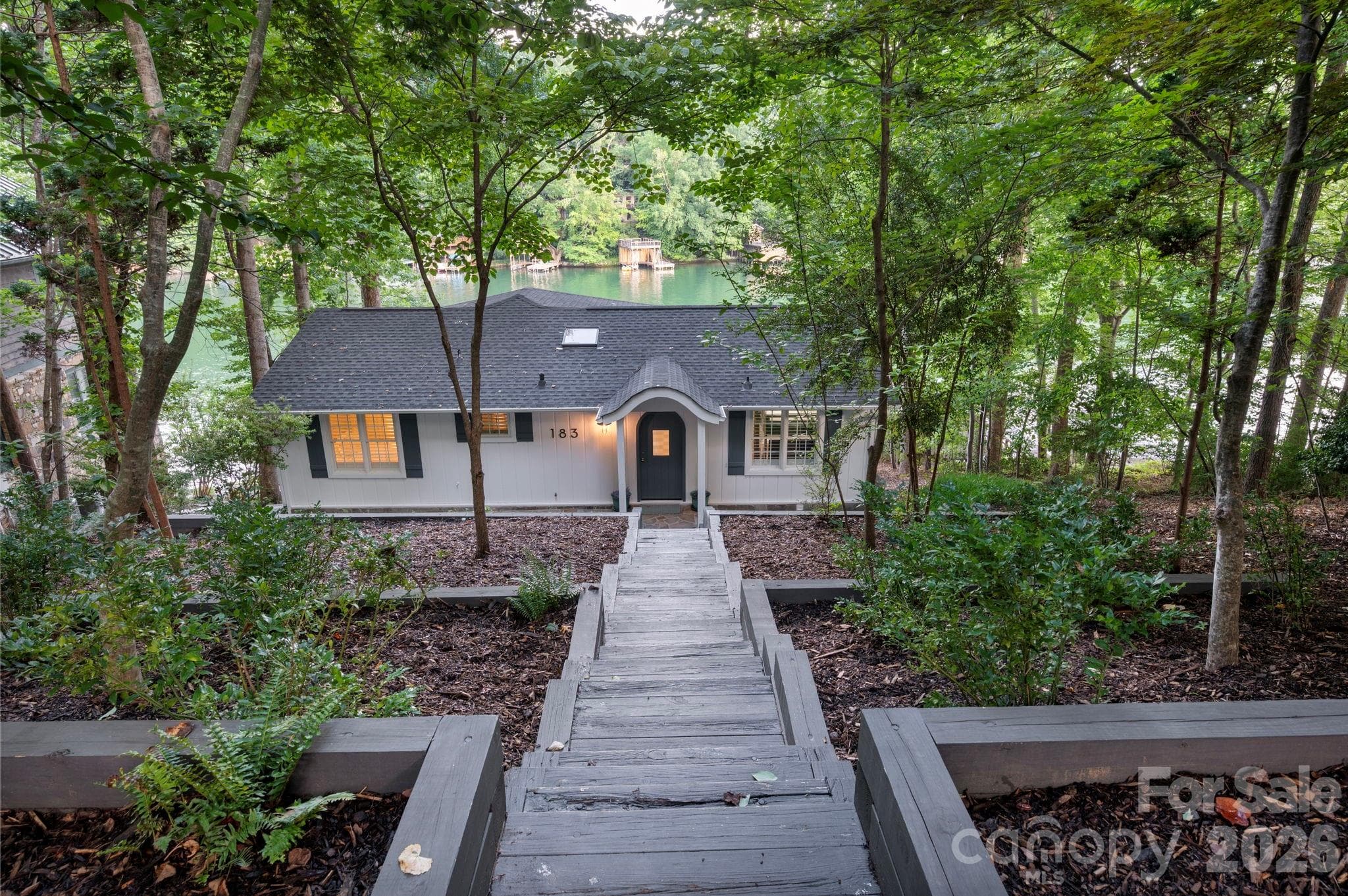 Flat approach and driveway with parking for four cars tandem. - 183 Blarney Road, Lake Lure