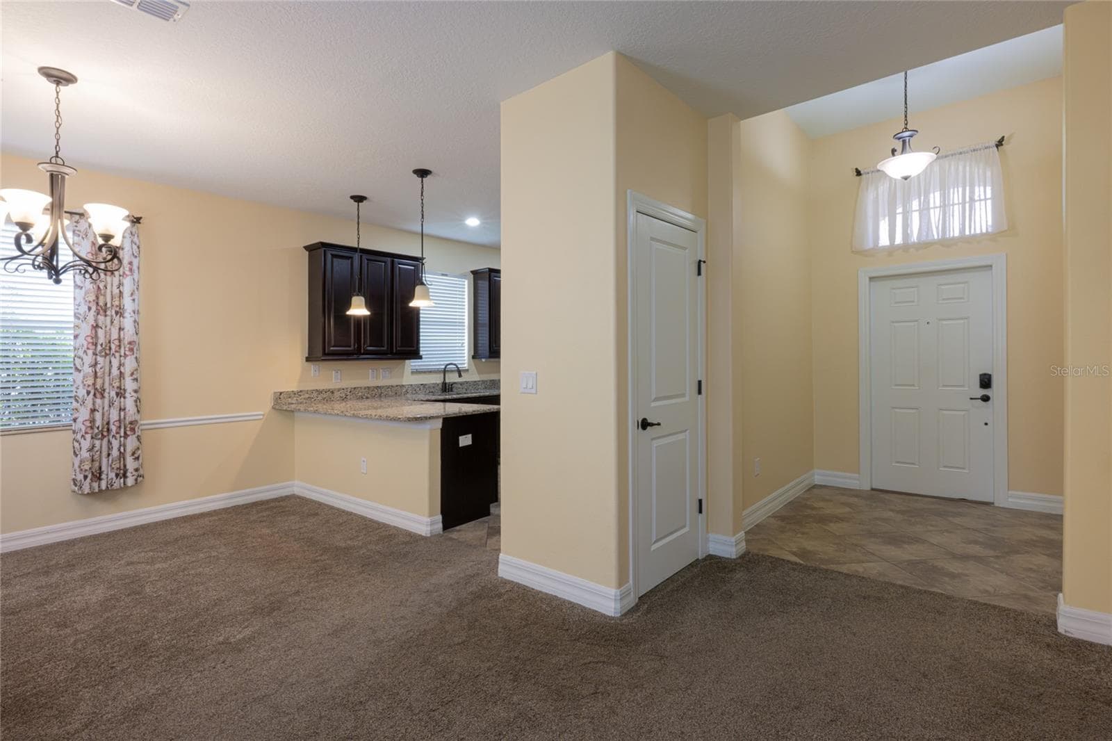 foyer dining kitchen - 3650 LIMESTONE ST, CLERMONT