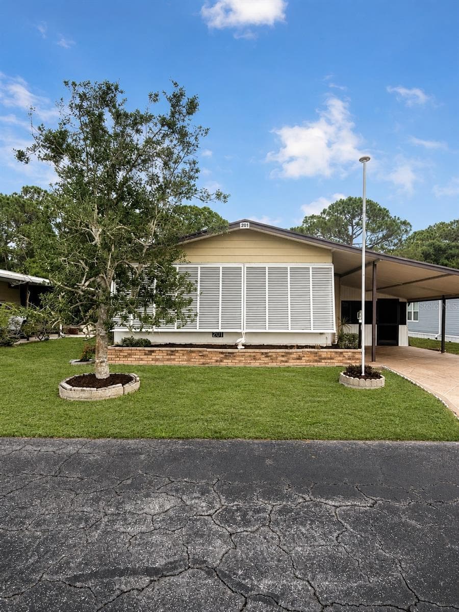 Manufactured Home at 201 N FIJI CIR, ENGLEWOOD, photo 4 of 22