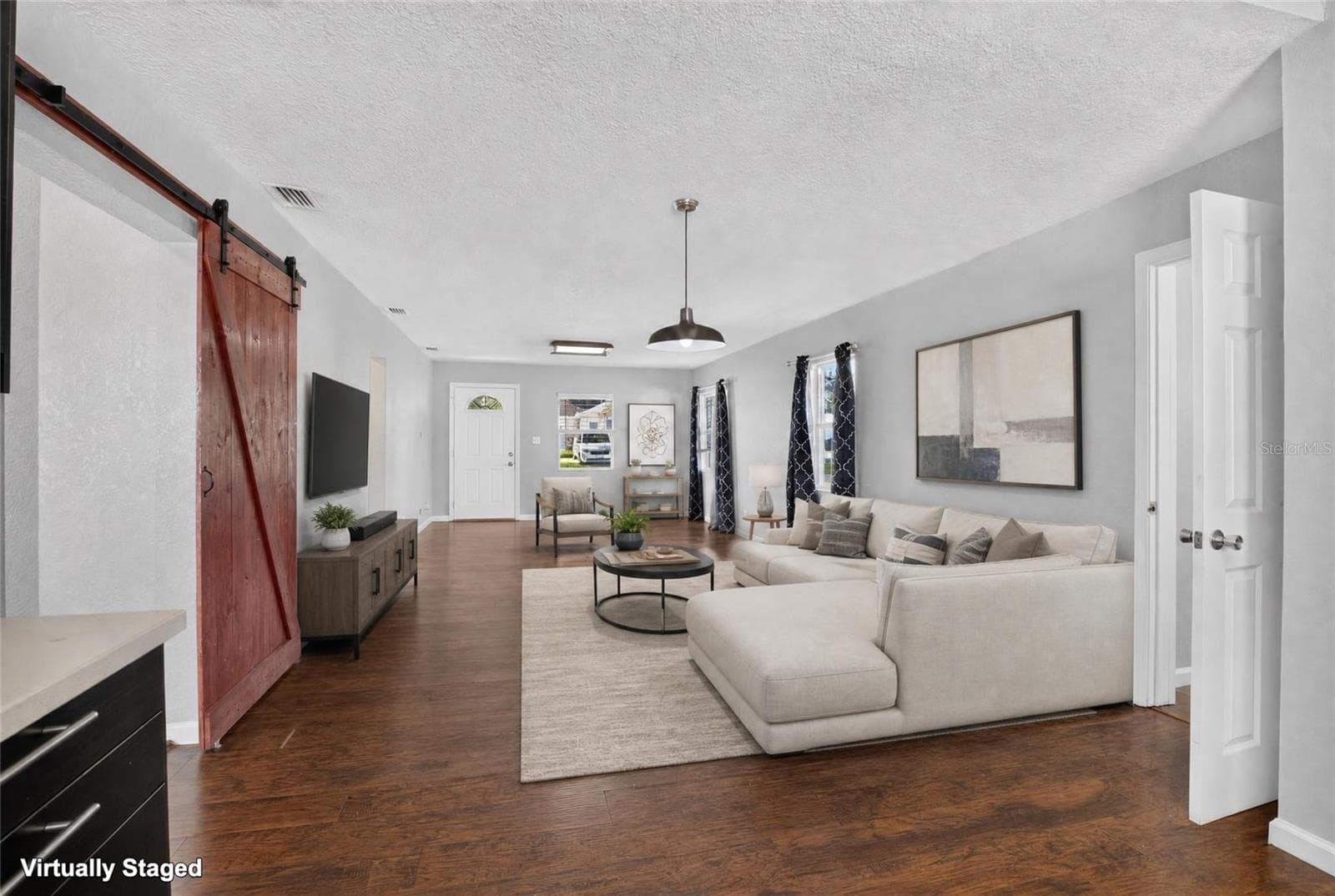 living and dining room - 4104 ORANGE AVE SE, HIGHLAND CITY