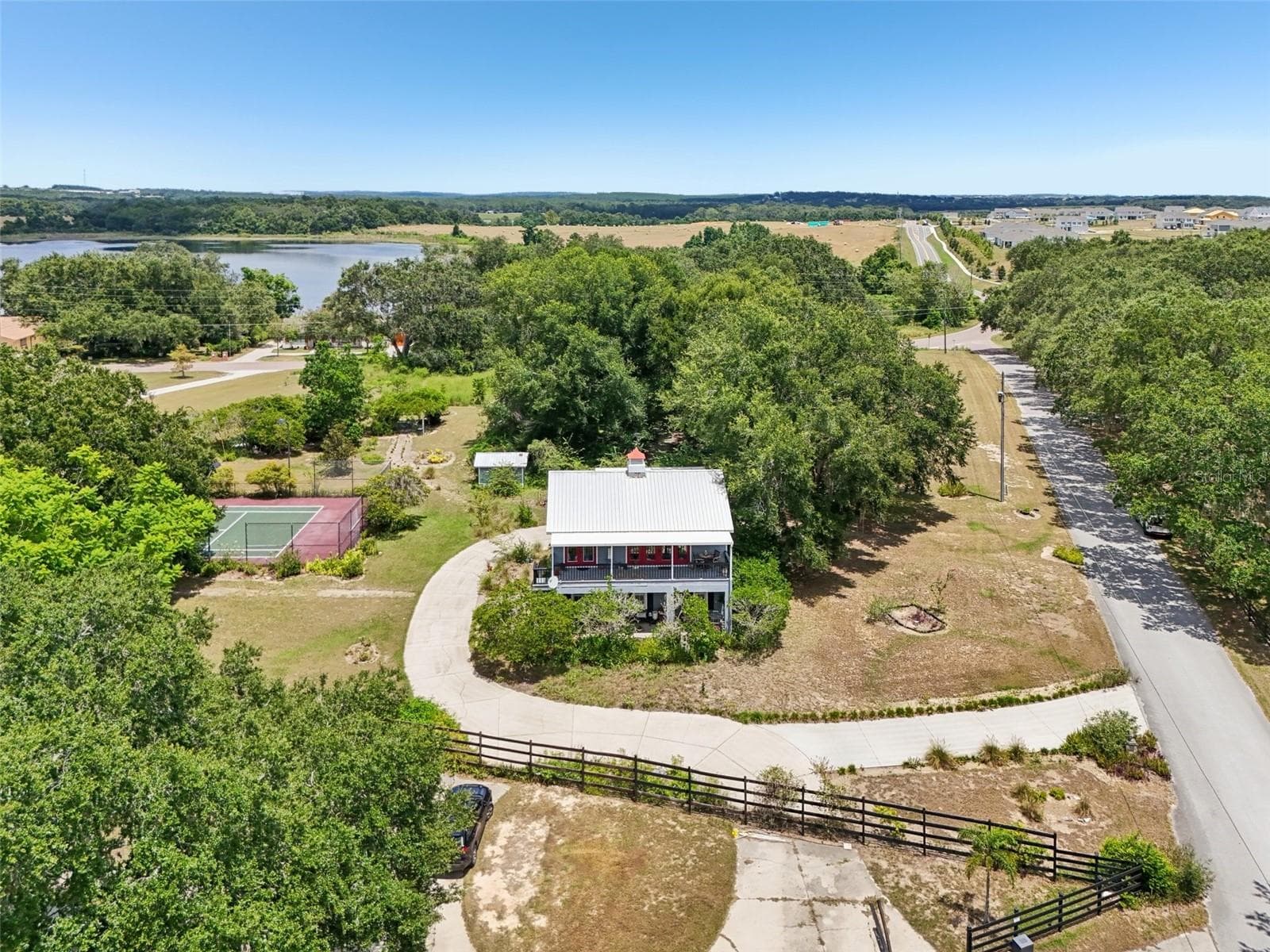 Aerial front of house and driveway off Rose St - 18249 ROSE ST, GROVELAND