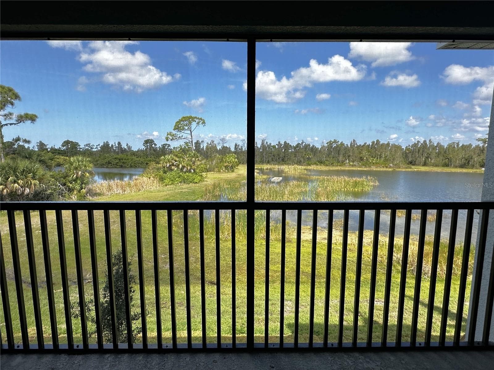 Rear screened in lanai - 14271 HERITAGE LANDING BLVD #1523, PUNTA GORDA