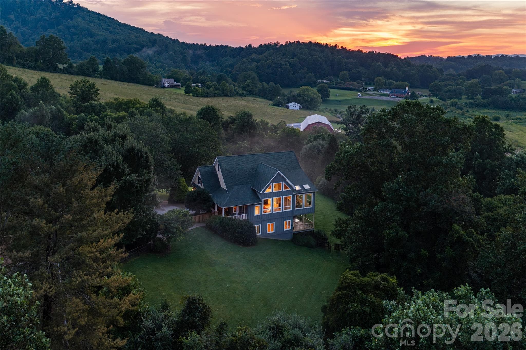 Breathtaking mountain views each evening or offer the perfect backdrop to start your day with a cup of coffee - 33 Bridle Path Drive, Barnardsville