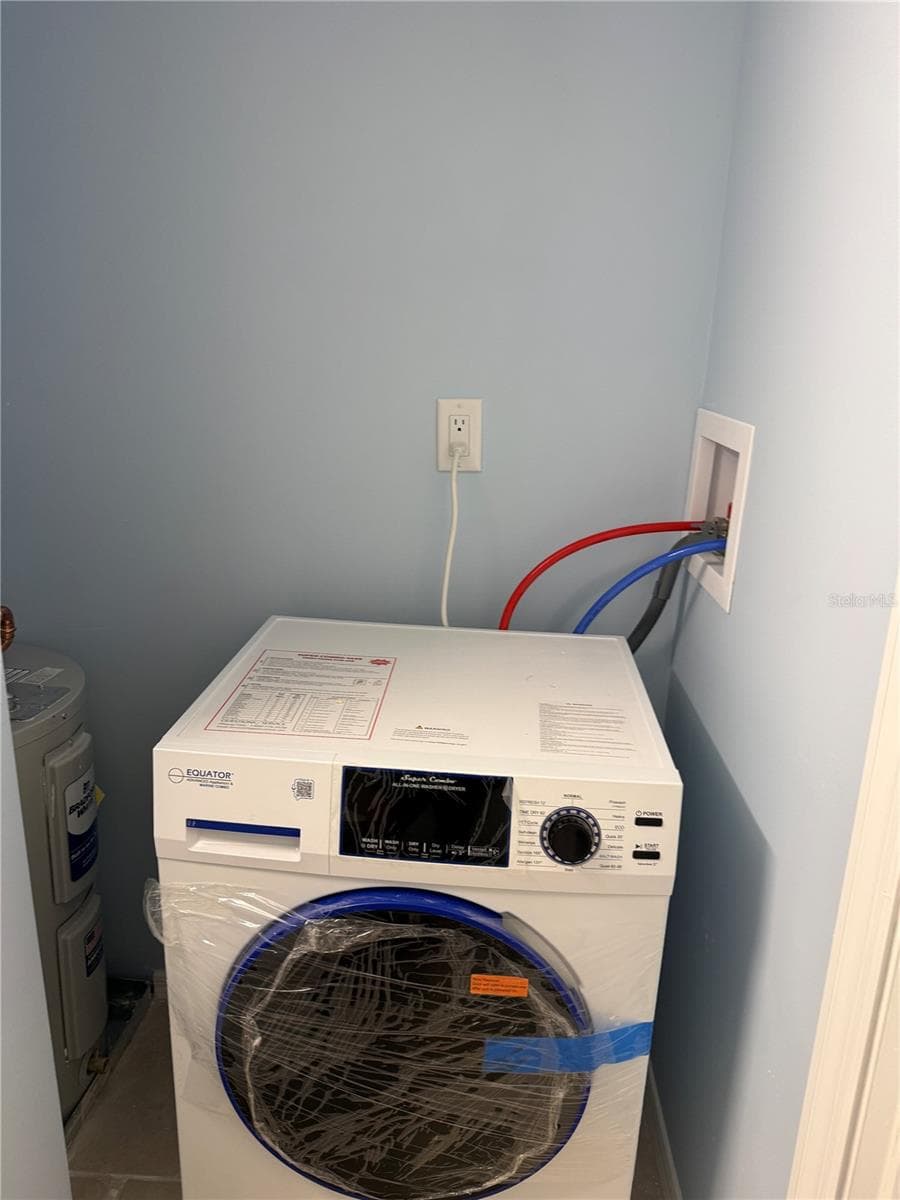 Washer/dryer combo Plenty of room to addshelves. - 179 MEDALLION BLVD #D, MADEIRA BEACH